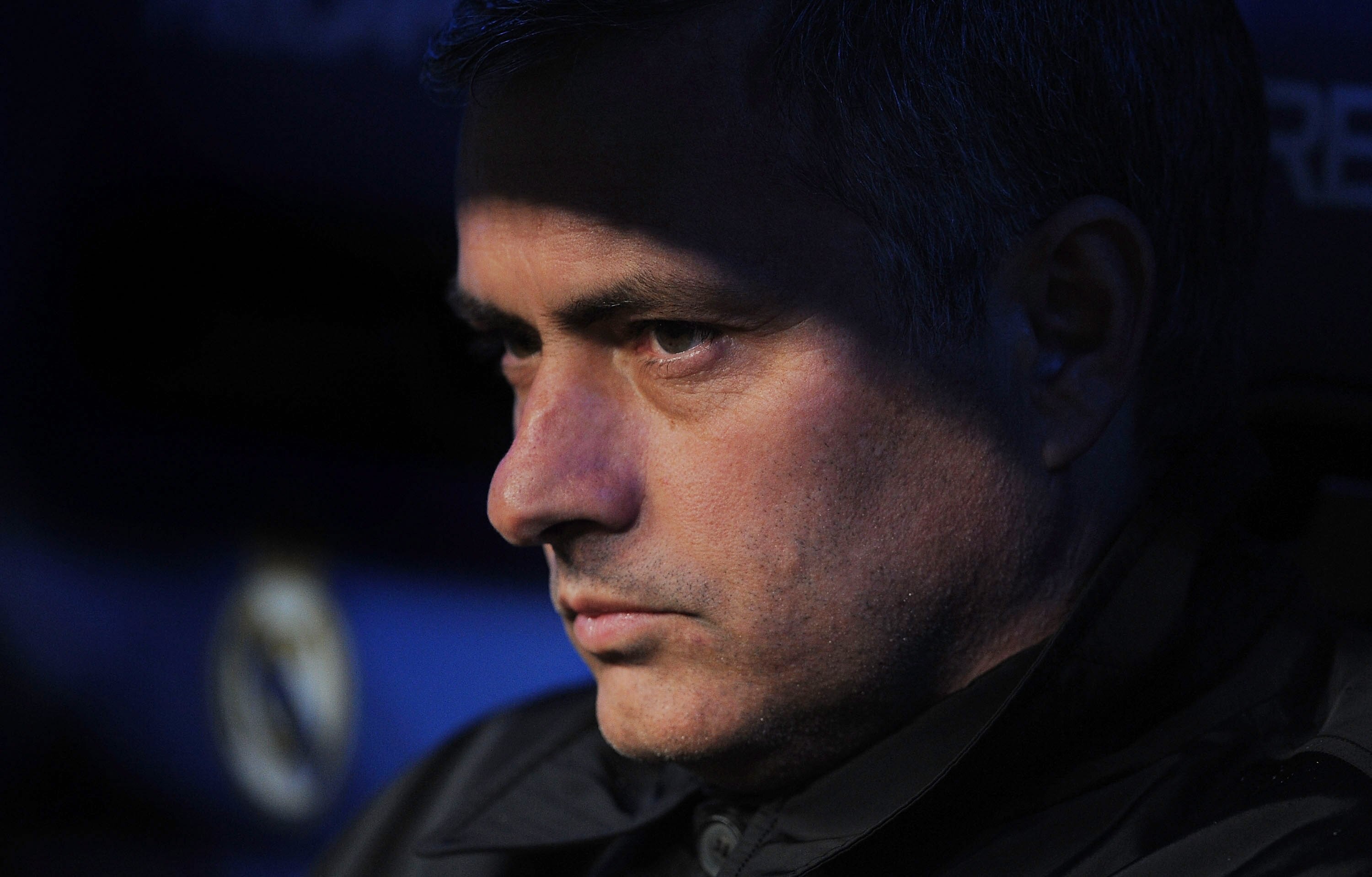 MADRID, SPAIN - FEBRUARY 19:  Head coach Jose Mourinho of Real Madrid looks out from the subs bench before the start of the La Liga match between Real Madrid and Levante at Estadio Santiago Bernabeu on February 19, 2011 in Madrid, Spain.  (Photo by Denis