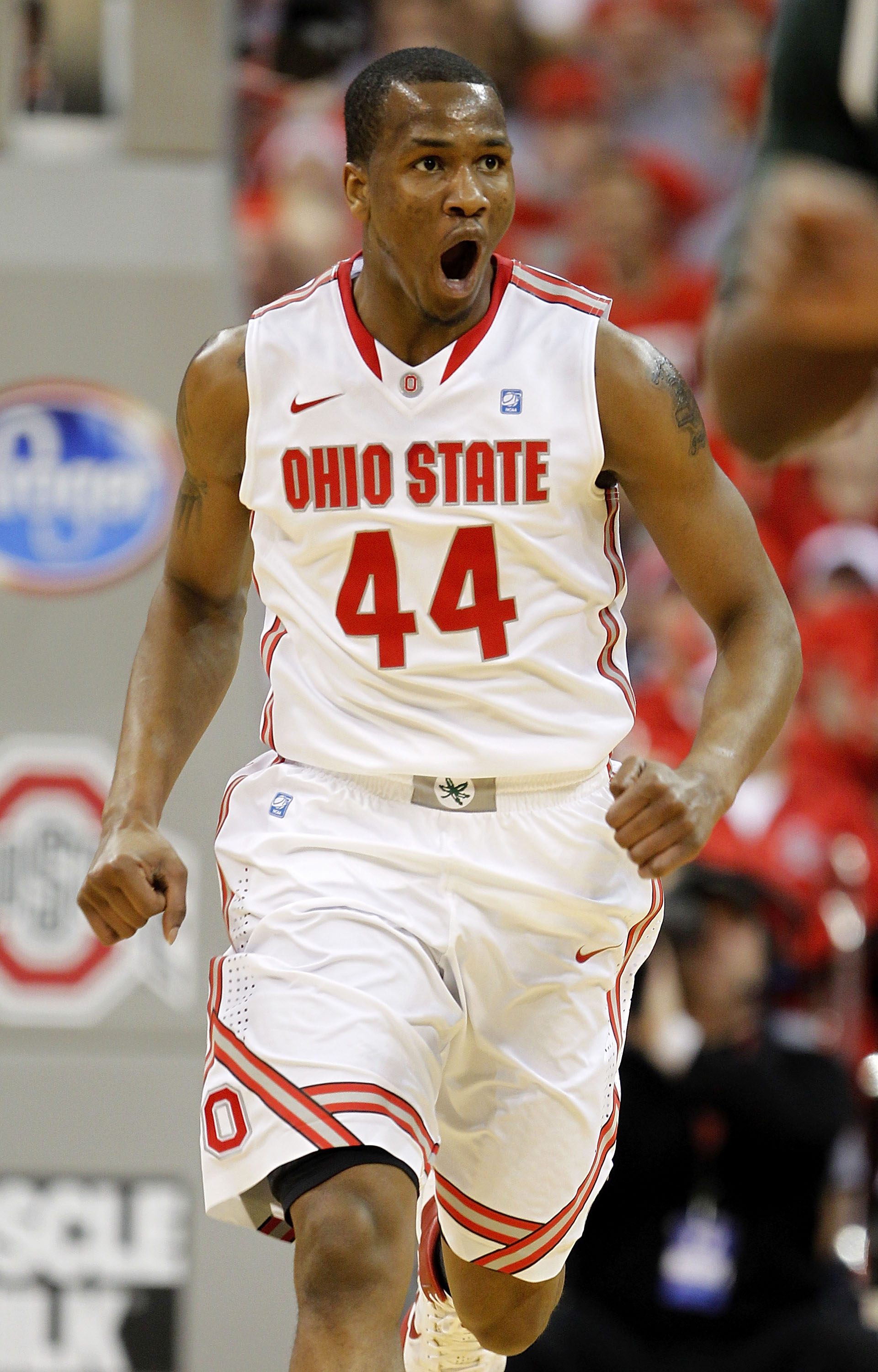 COLUMBUS, OH - FEBRUARY 15: William Buford #44 of the Ohio State Buckeyes celebrates after dunking the ball during the first half against the Michigan State Spartons on February 15, 2011 at Value City Arena in Columbus, Ohio.  (Photo by Gregory Shamus/Get