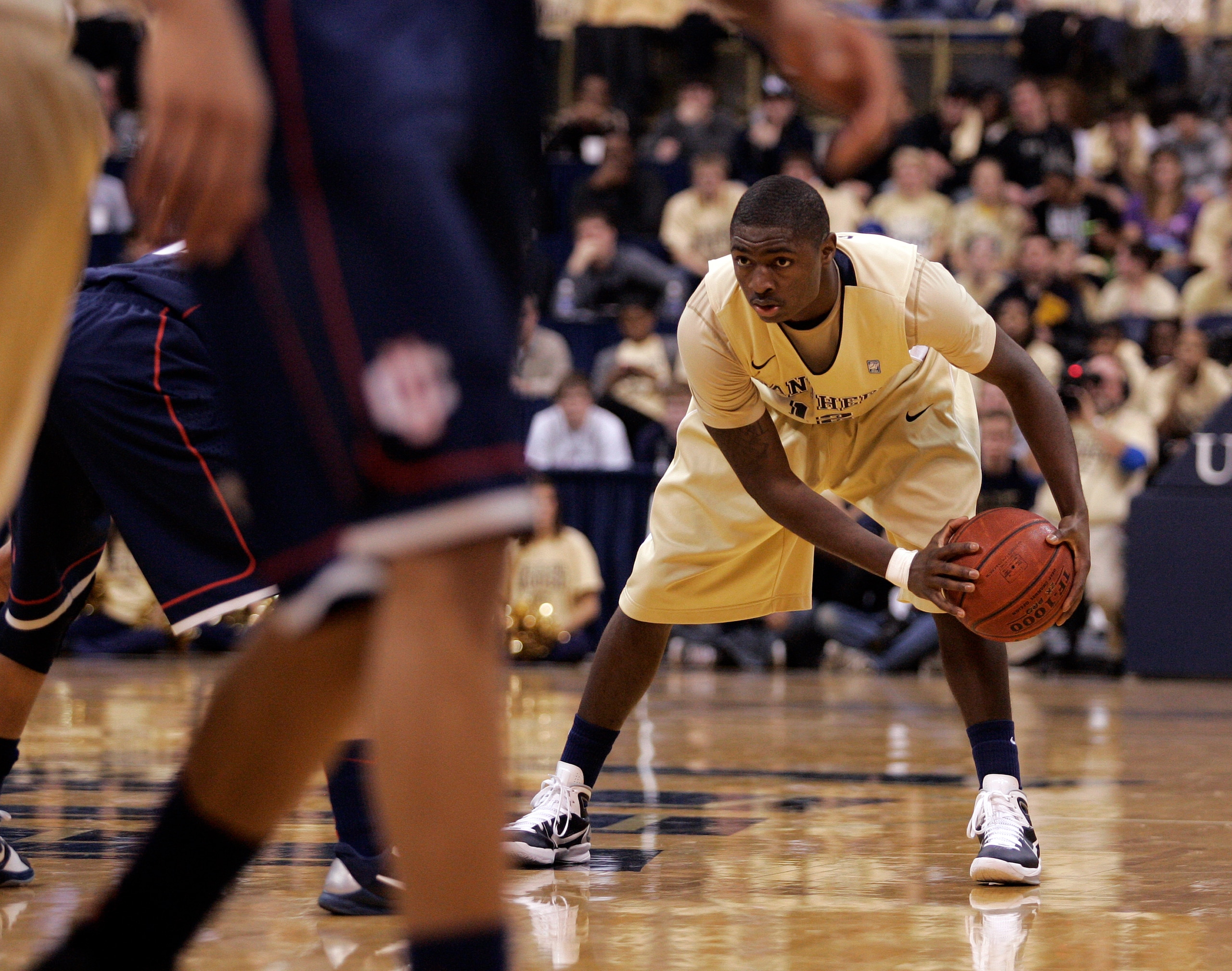PITTSBURGH, PA - DECEMBER 27:  Ashton Gibbs #12 of the Pittsburgh Panthers looks to make a pass against the Connecticut Huskies at Petersen Events Center on December 27, 2010 in Pittsburgh, Pennsylvania.  Pittsburgh defeated Connecticut 78-64.  (Photo by