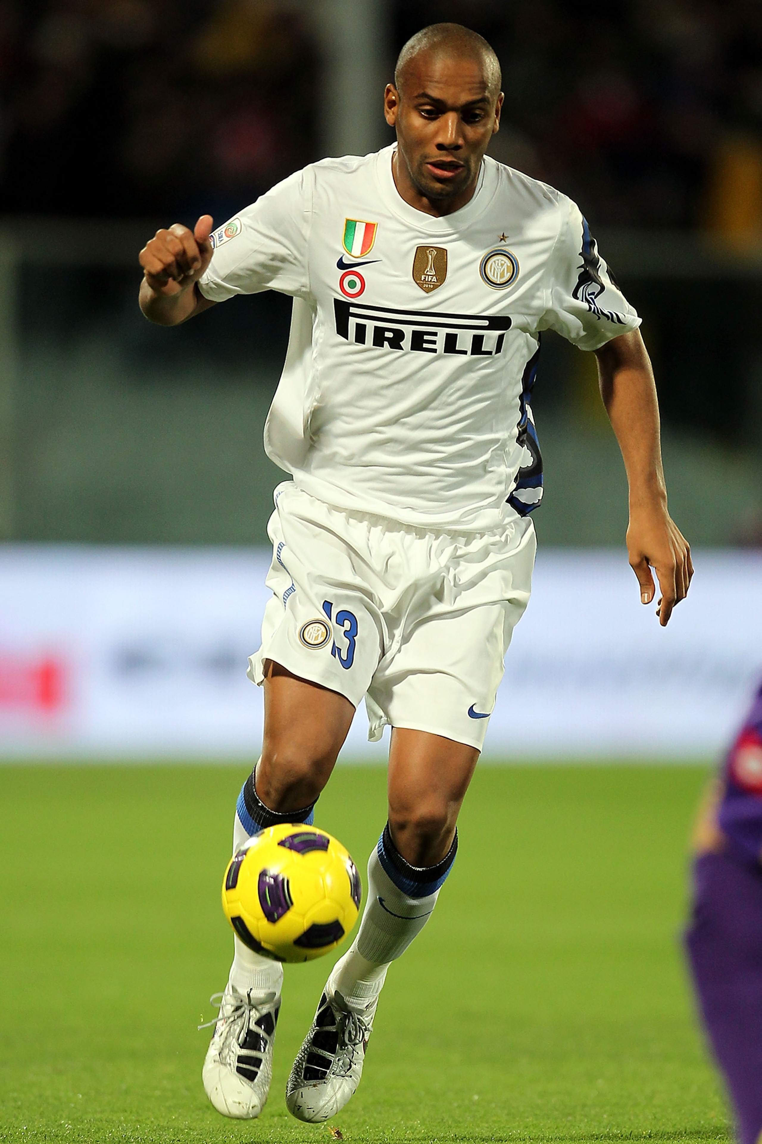 FLORENCE, ITALY - FEBRUARY 16: Maicon of FC Internazionale Milano in action during during the Serie A match between ACF Fiorentina and FC Internazionale Milano at Stadio Artemio Franchi on February 16, 2011 in Florence, Italy.  (Photo by Gabriele Maltinti