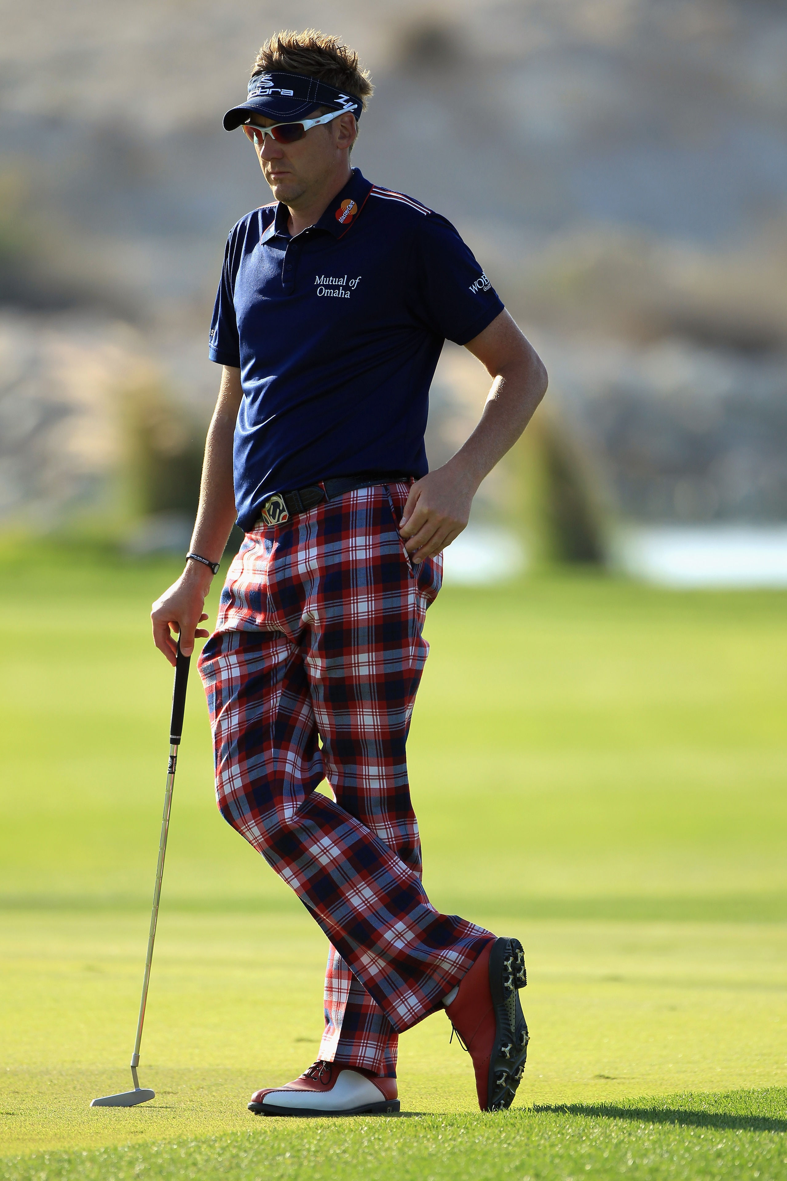 DOHA, QATAR - FEBRUARY 04:  Ian Poulter of England in action during the second round of the Commercialbank Qatar Masters held at Doha Golf Club on February 4, 2011 in Doha, Qatar.  (Photo by Andrew Redington/Getty Images)
