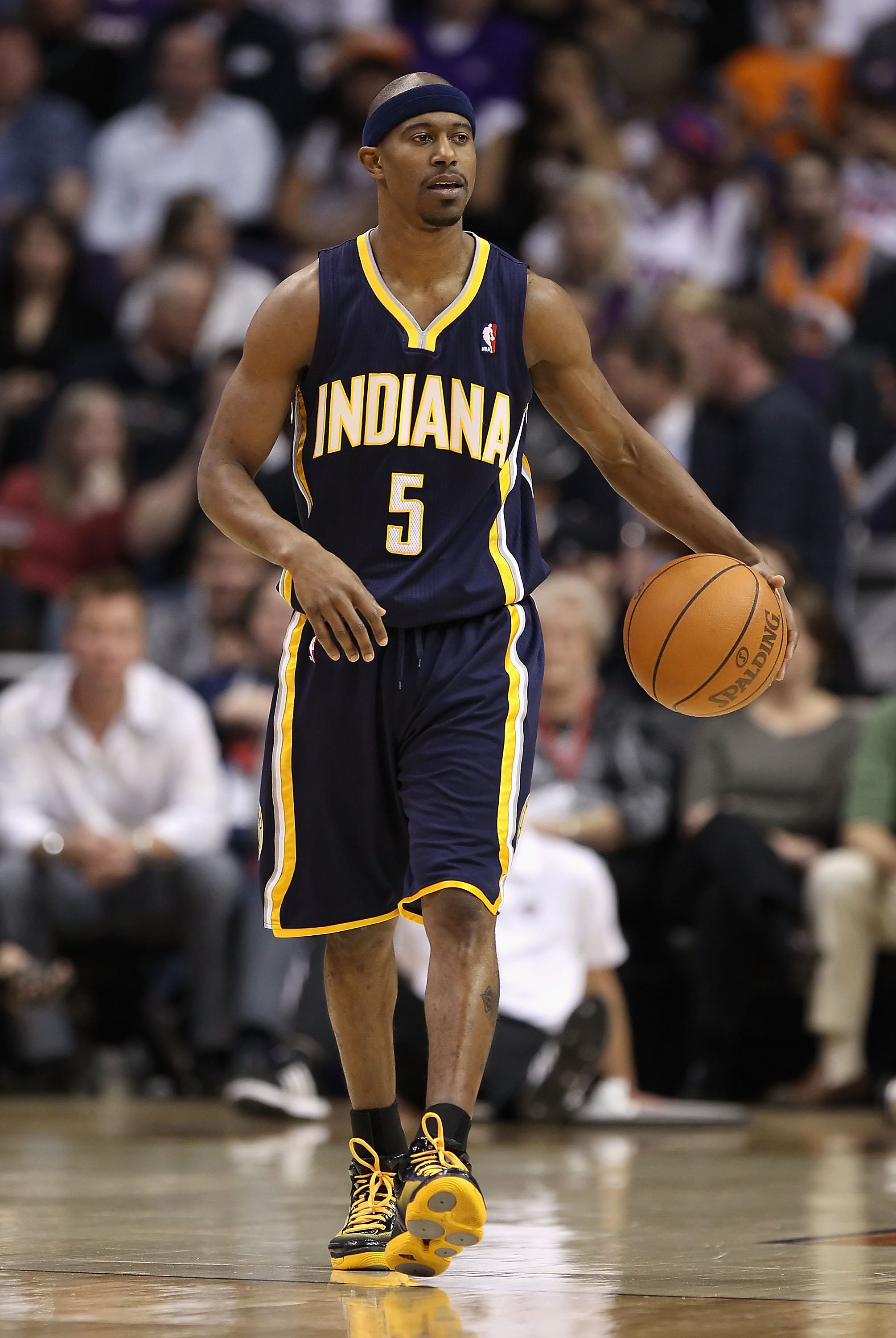 PHOENIX - DECEMBER 03:  T.J. Ford #5 of the Indiana Pacers handles the ball during the NBA game against the Phoenix Suns at US Airways Center on December 3, 2010 in Phoenix, Arizona.  The Suns defeated the Pacers 105-97.  NOTE TO USER: User expressly ackn