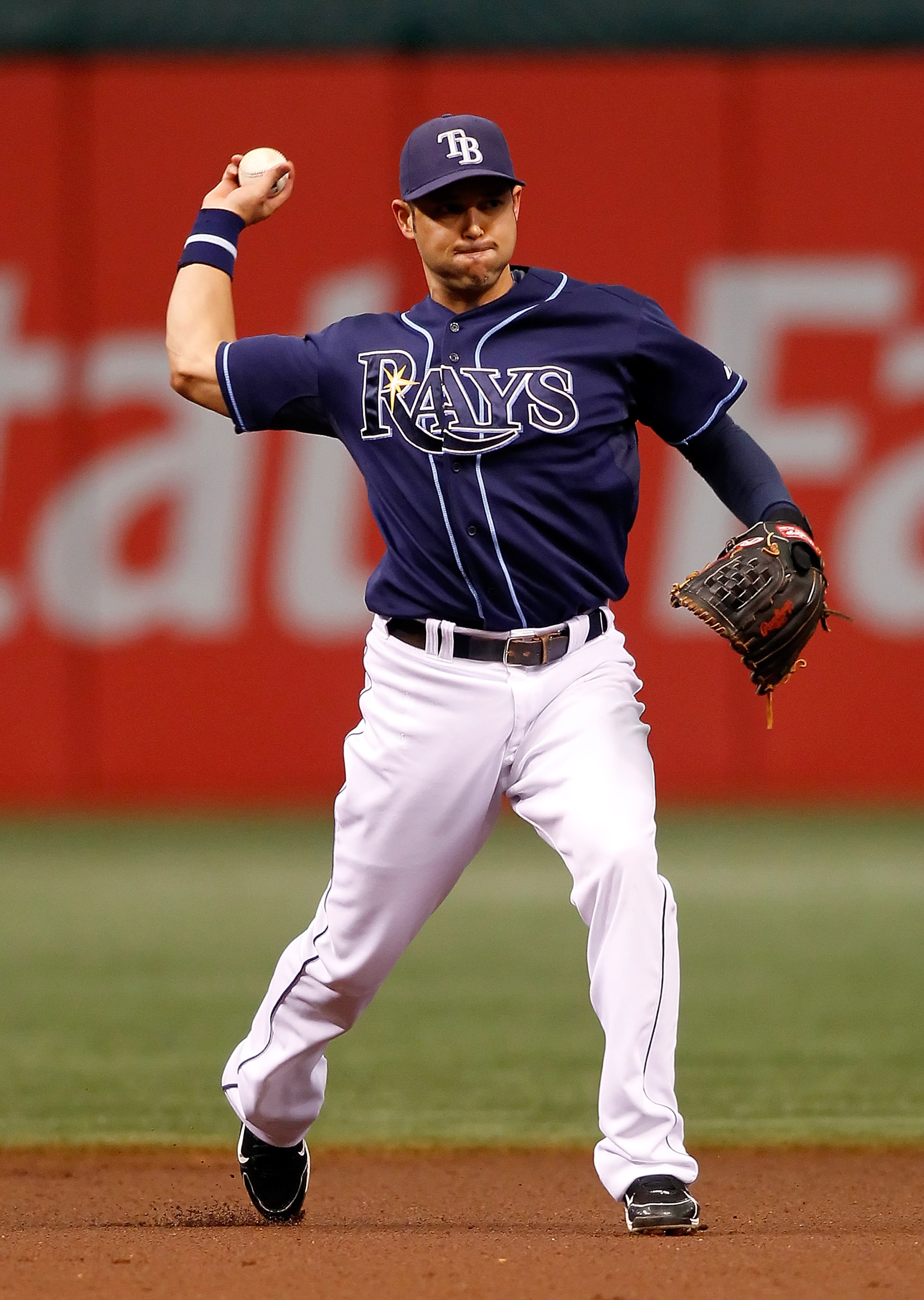 ST. PETERSBURG - OCTOBER 07: Shortstop Jason Bartlett #8 of the Tampa Bay Rays throws over to first for an out against the Texas Rangers during Game 2 of the ALDS at Tropicana Field on October 7, 2010 in St. Petersburg, Florida. (Photo by J. Meric/Getty ST. PETERSBURG - OCTOBER 07: Shortstop Jason Bartlett #8 of the Tampa Bay Rays throws over to first for an out against the Texas Rangers during Game 2 of the ALDS at Tropicana Field on October 7, 2010 in St. Petersburg, Florida. (Photo by J. Meric/Getty
