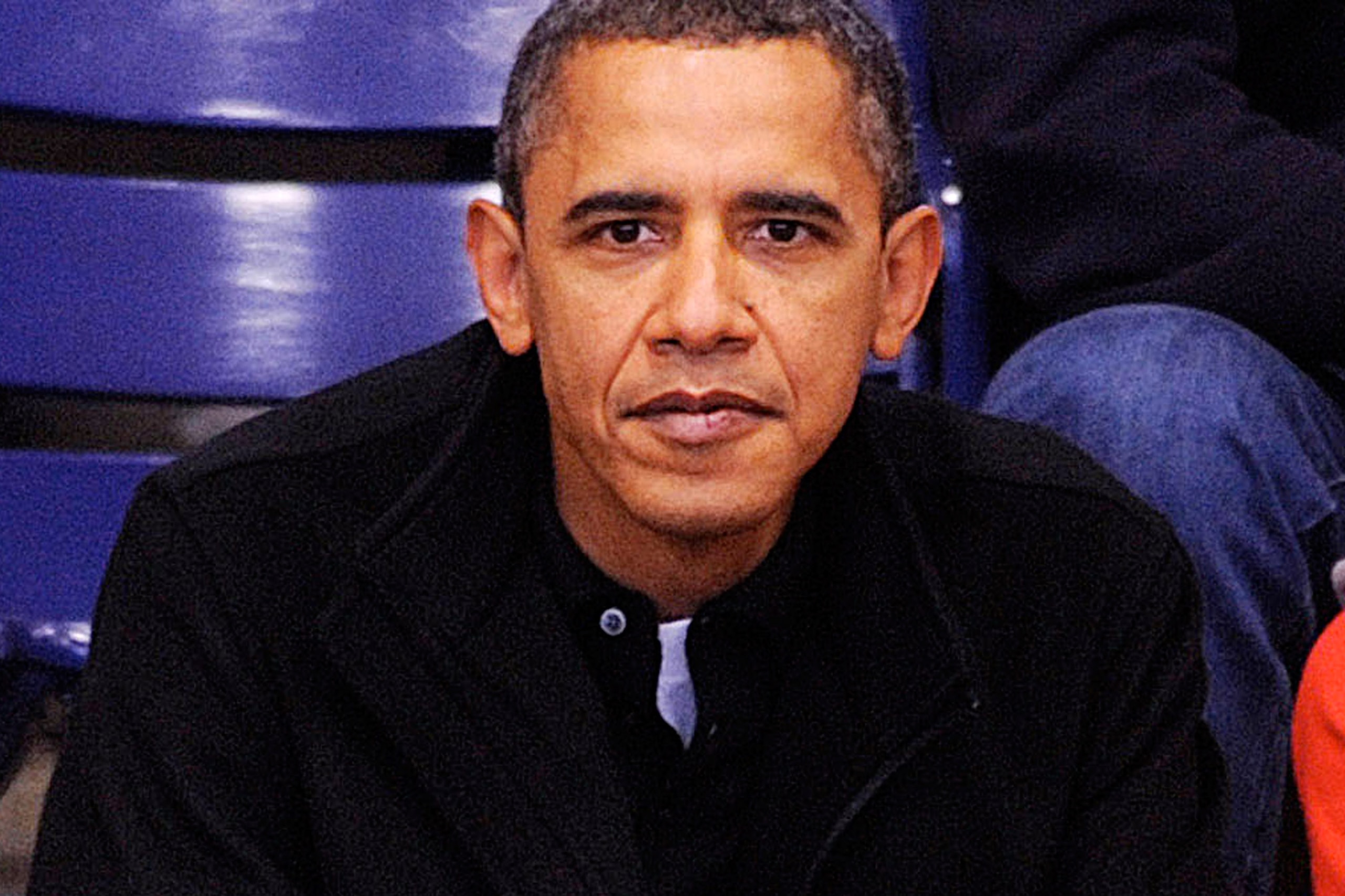 WASHINGTON - NOVEMBER 27:  (AFP OUT) U.S. President Barack Obama watches a college basketball game at Howard University November 27, 2010 in Washington, DC. President Barack Obama attended the game between Howard University and Oregon State, which is coac