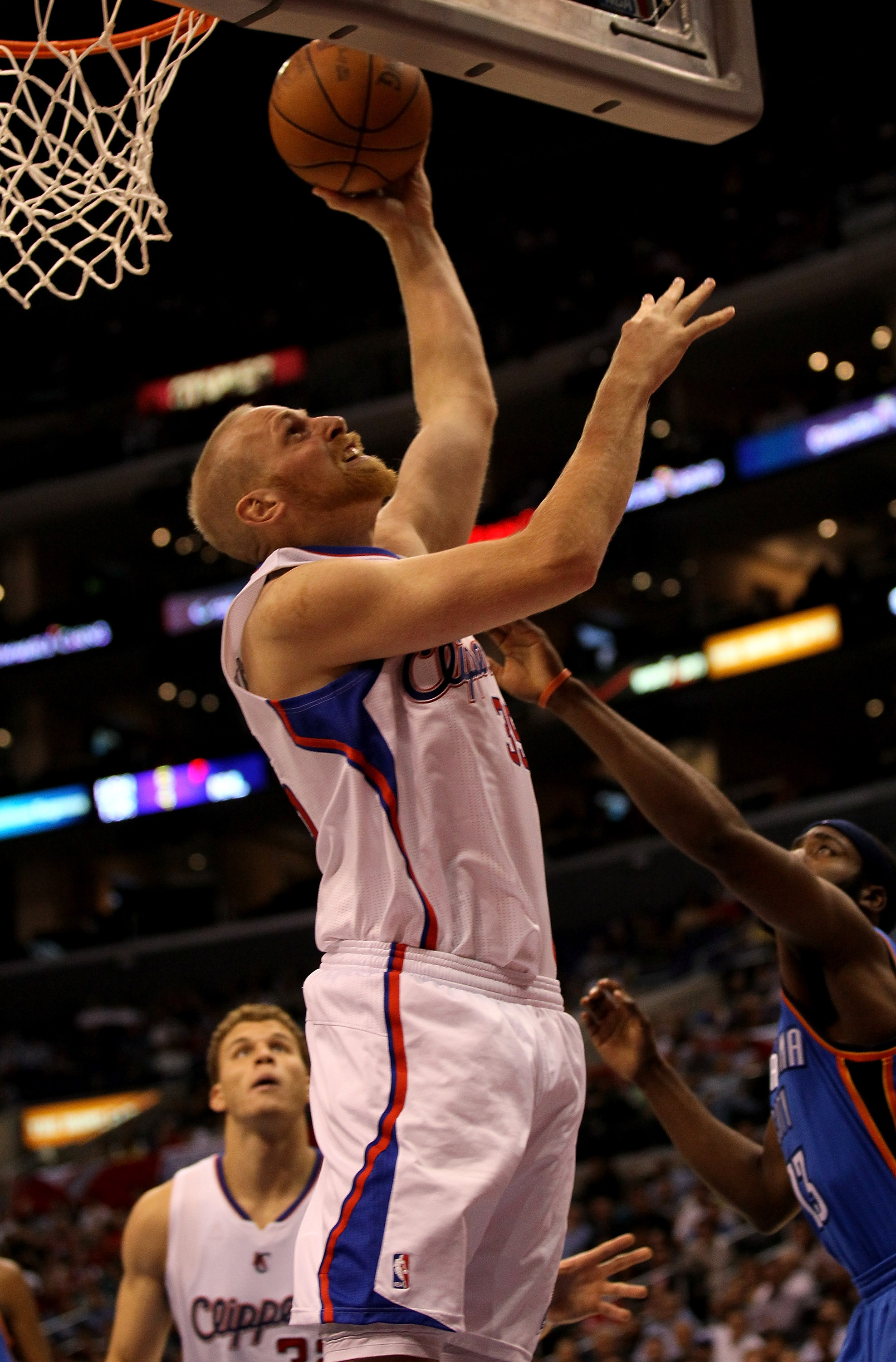 LOS ANGELES - NOVEMBER 3: Chris Kaman #35 of the Los Angeles Clippers shoots against the Oklahoma City Thunder at Staples Center on November 3, 2010 in Los Angeles, California. The Clippers won 107-92.  NOTE TO USER: User expressly acknowledges and agrees