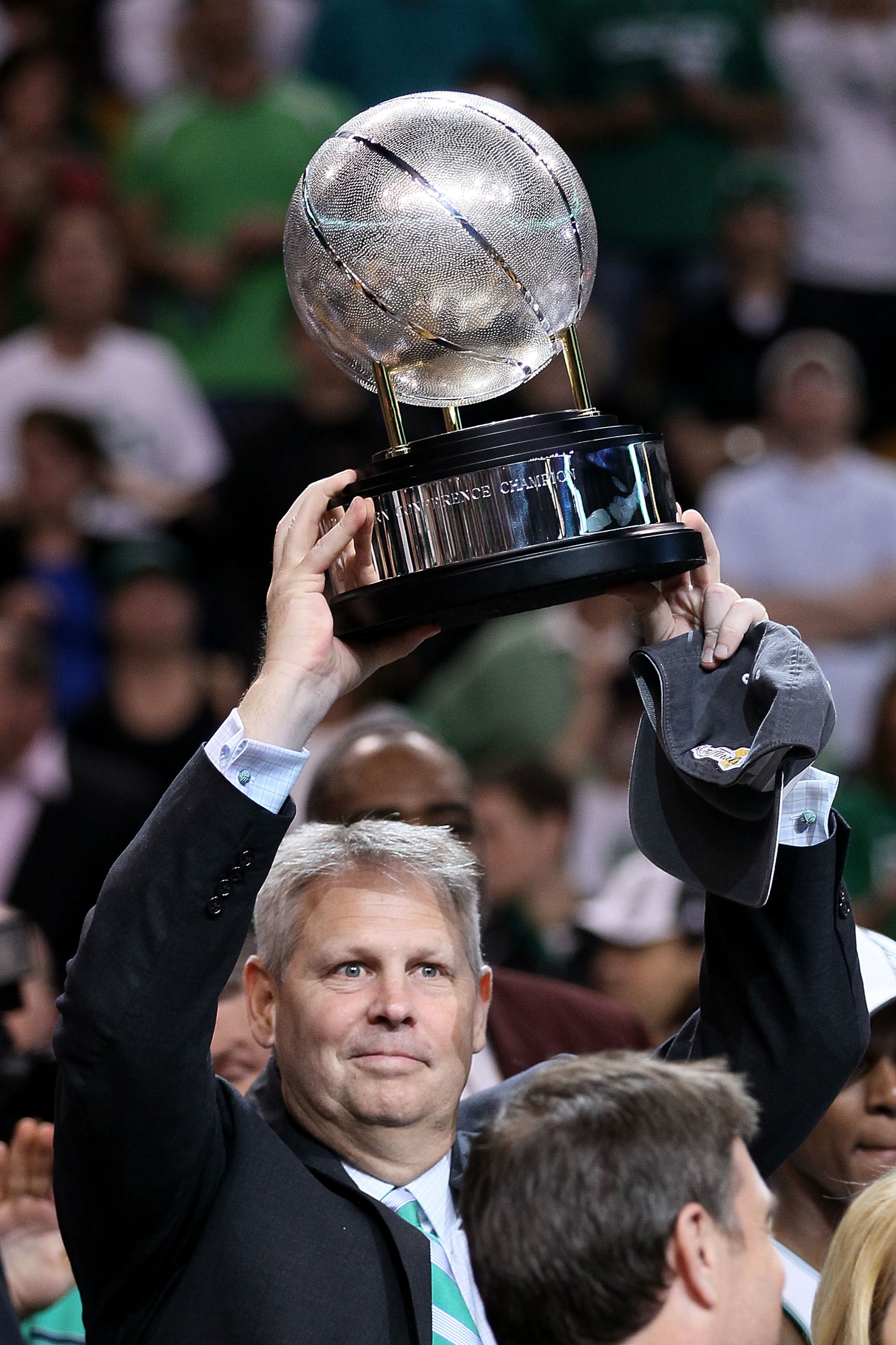 BOSTON - MAY 28:  Team president Danny Ainge of the Boston Celtics celebrates with the Eastern COnference trophy after the Celtics won 96-84 against the Orlando Magic in Game Six of the Eastern Conference Finals during the 2010 NBA Playoffs at TD Garden o