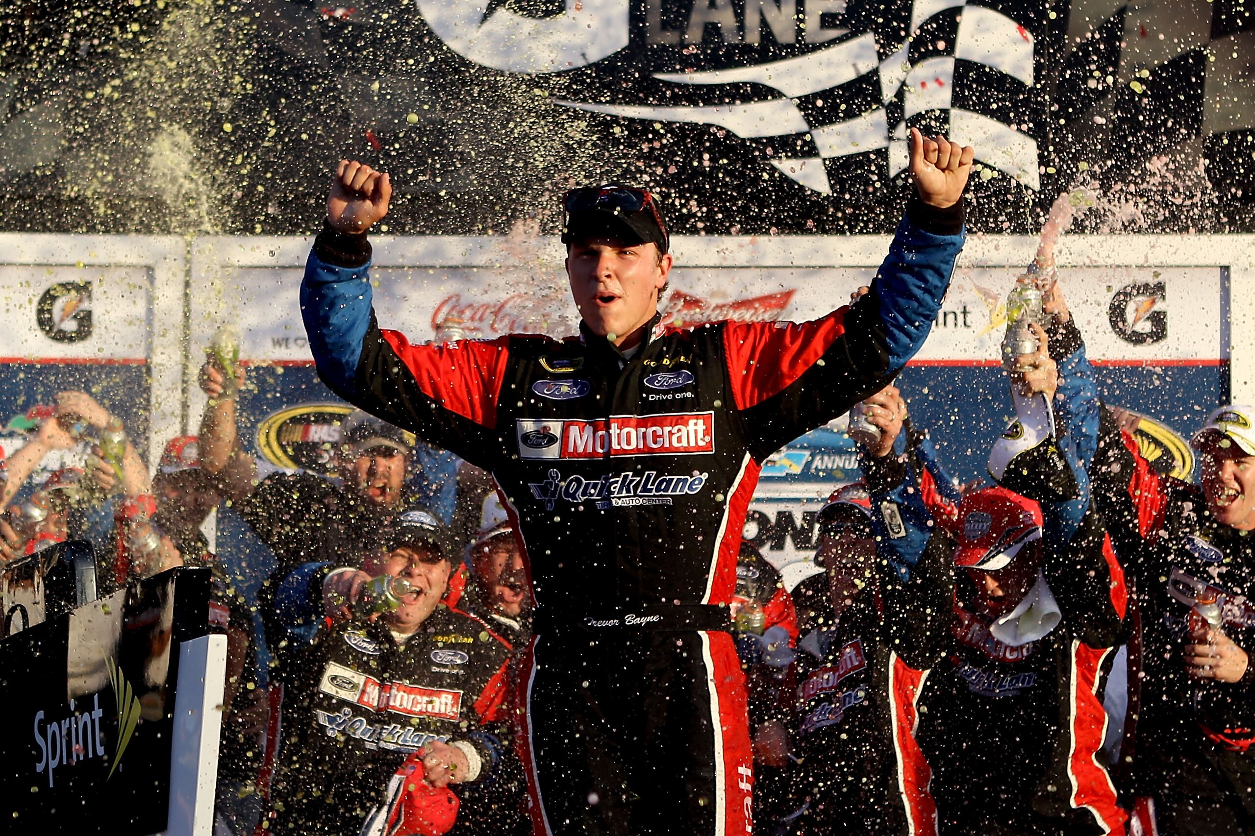 DAYTONA BEACH, FL - FEBRUARY 20: Trevor Bayne, driver of the #21 Motorcraft/Quick Lane Ford, celebrates in Victory Lane after winning the NASCAR Sprint Cup Series Daytona 500 at Daytona International Speedway on February 20, 2011 in Daytona Beach, Florid DAYTONA BEACH, FL - FEBRUARY 20: Trevor Bayne, driver of the #21 Motorcraft/Quick Lane Ford, celebrates in Victory Lane after winning the NASCAR Sprint Cup Series Daytona 500 at Daytona International Speedway on February 20, 2011 in Daytona Beach, Florid