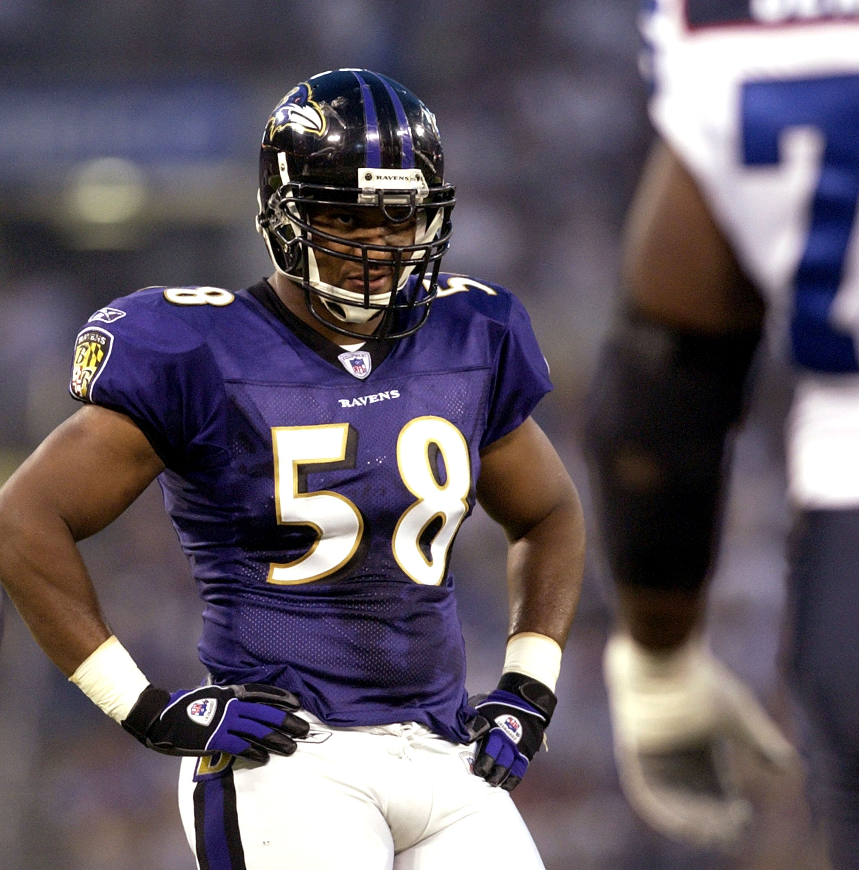 Baltimore Ravens linebacker Peter Boulware during action against the Buffalo Bills in Baltimore, Maryland,  Aug. 9, 2003. The Bills defeated the Ravens 20 - 19 in pre-season play.  (Photo by Al Messerschmidt/Getty Images)