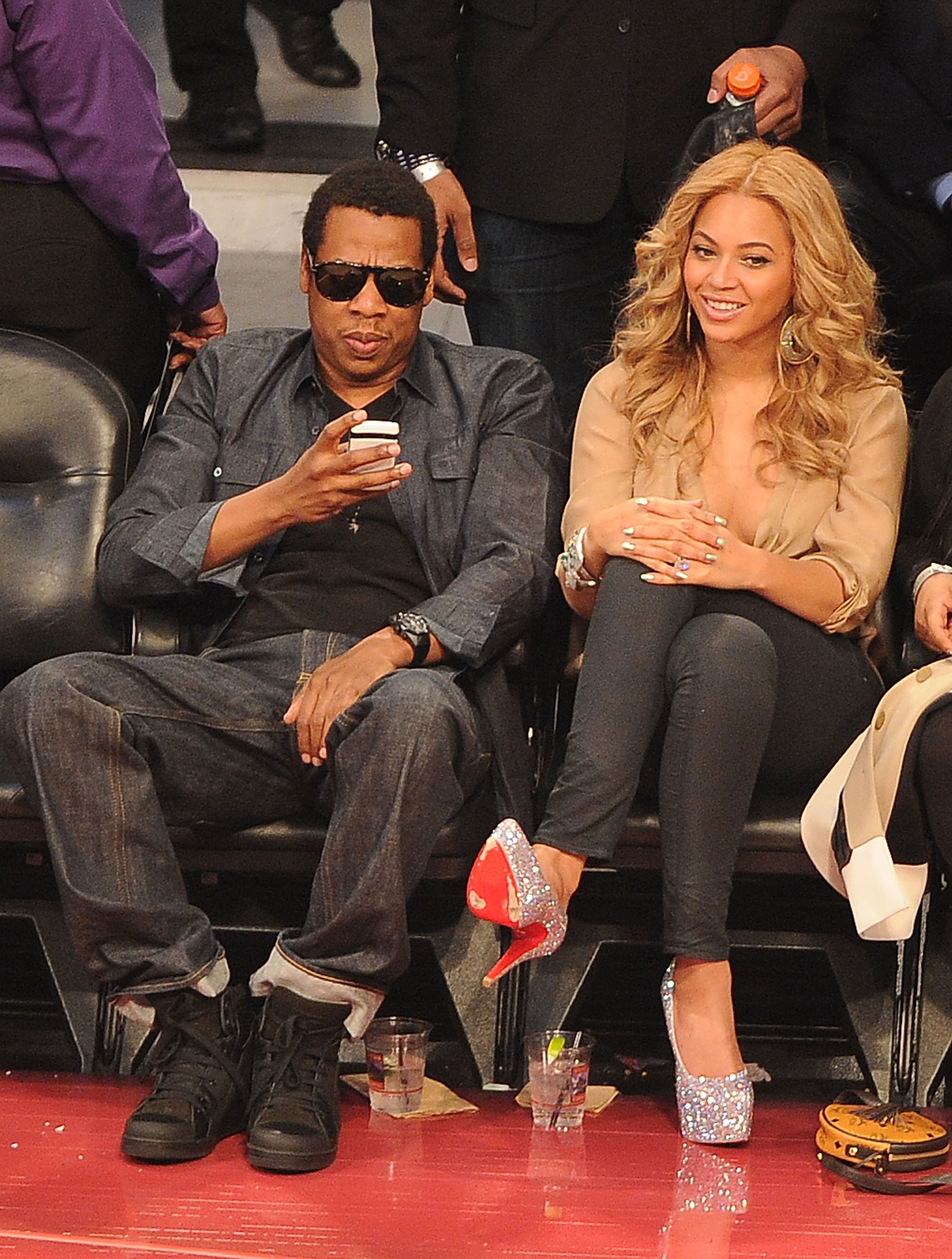 LOS ANGELES, CA - FEBRUARY 20:  Jay-Z (L) and singer Beyonce Knowles during the 2011 NBA All-Star game at Staples Center on February 20, 2011 in Los Angeles, California. NOTE TO USER: User expressly acknowledges and agrees that, by downloading and or usin