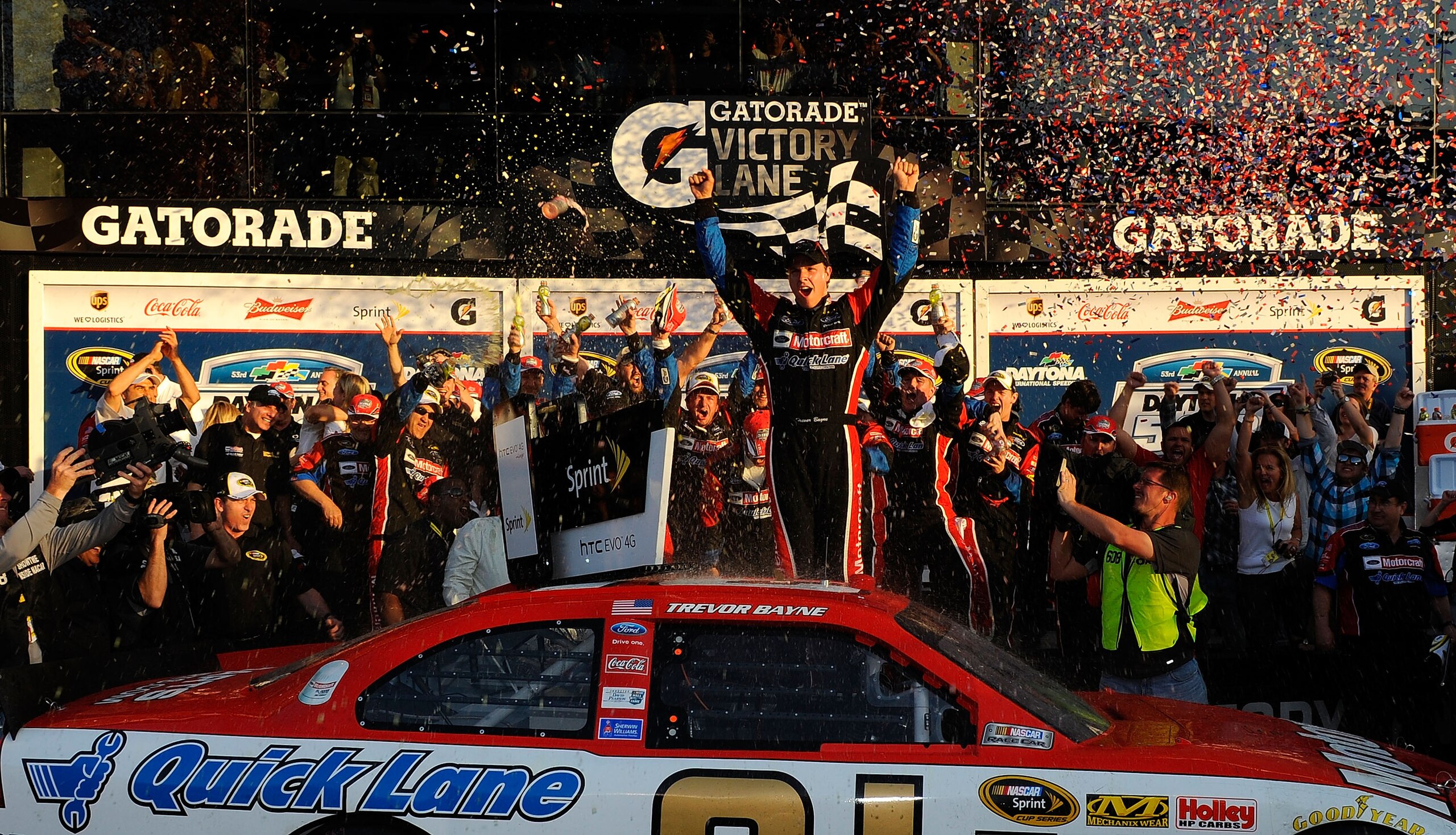 DAYTONA BEACH, FL - FEBRUARY 20: Trevor Bayne, driver of the #21 Motorcraft/Quick Lane Ford, celebrates in Victory Lane after winning the NASCAR Sprint Cup Series Daytona 500 at Daytona International Speedway on February 20, 2011 in Daytona Beach, Florid DAYTONA BEACH, FL - FEBRUARY 20: Trevor Bayne, driver of the #21 Motorcraft/Quick Lane Ford, celebrates in Victory Lane after winning the NASCAR Sprint Cup Series Daytona 500 at Daytona International Speedway on February 20, 2011 in Daytona Beach, Florid