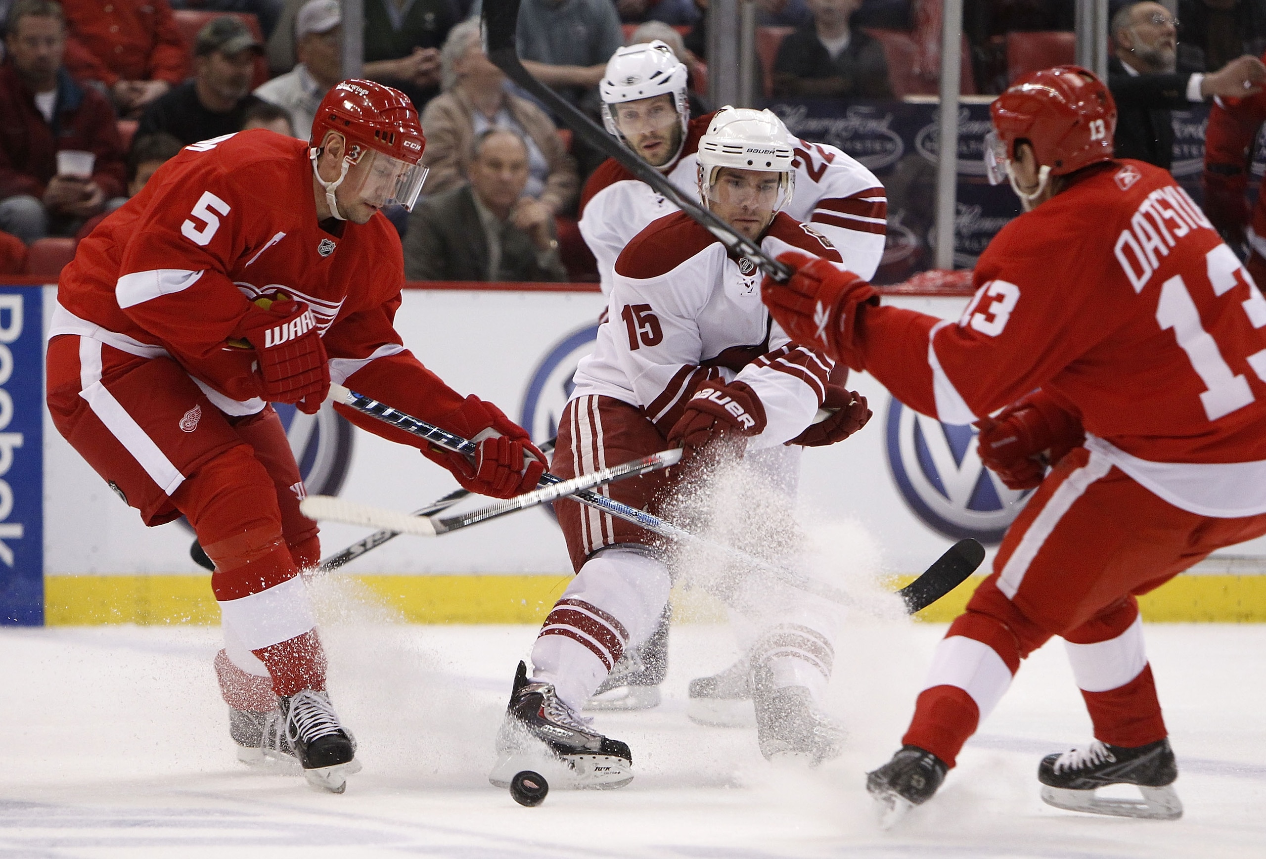 DETROIT - APRIL 20: Matthew Lombardi #15 of the Phoenix Coyotes battles for the puck with Nicklas Lidstrom #5 and Pavel Datsyuk #13 of the Detroit Red Wings during Game Four of the Western Conference Quarterfinals of the 2010 NHL Stanley Cup Playoffs on A DETROIT - APRIL 20: Matthew Lombardi #15 of the Phoenix Coyotes battles for the puck with Nicklas Lidstrom #5 and Pavel Datsyuk #13 of the Detroit Red Wings during Game Four of the Western Conference Quarterfinals of the 2010 NHL Stanley Cup Playoffs on A