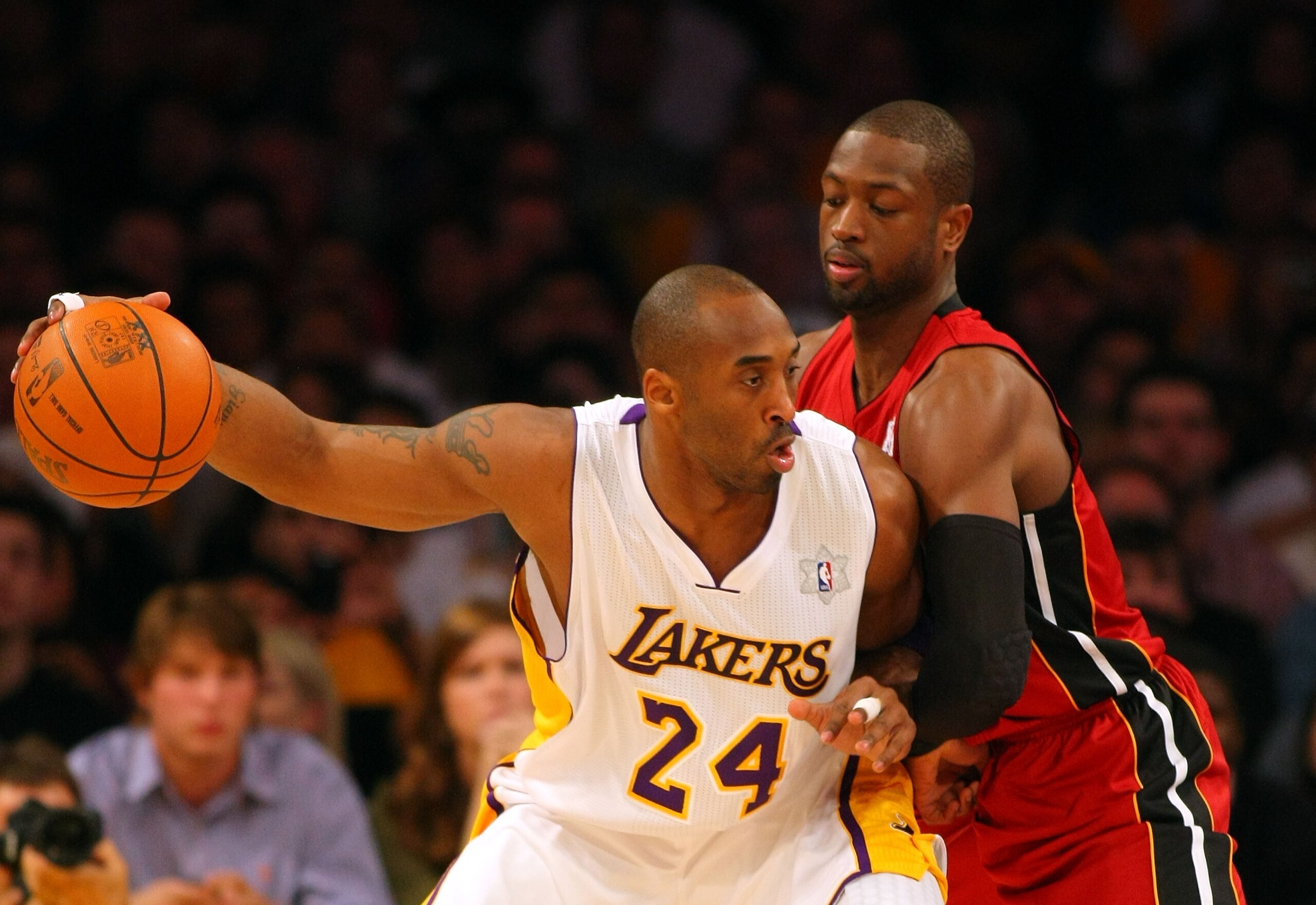 LOS ANGELES, CA - DECEMBER 25: Dwyane Wade #3 of the Miami Heat defends Kobe Bryant #24 of the Los Angeles Lakers during the NBA game at Staples Center on December 25, 2010 in Los Angeles, California. The Heat defeated the Lakers 96-80. (Photo by Victor D