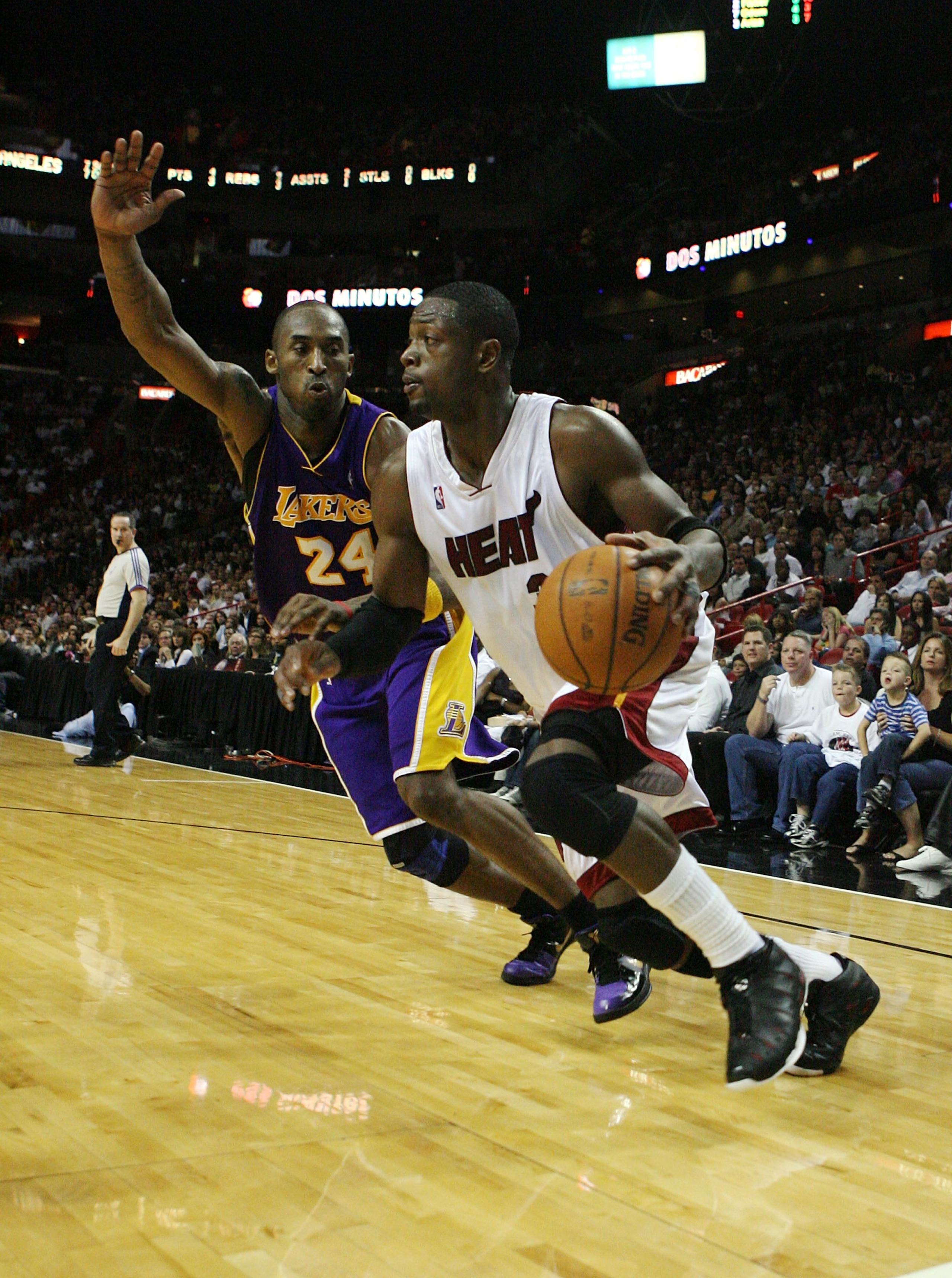 MIAMI - DECEMBER 19:  Dwyane Wade #3 of the Miami Heat drives past Kobe Bryant #24 of the Los Angeles Lakers at American Airlines Arena on December 19, 2008 in Miami, Florida. The Heat defeated the Lakers 89-87. NOTE TO USER: User expressly acknowledges a