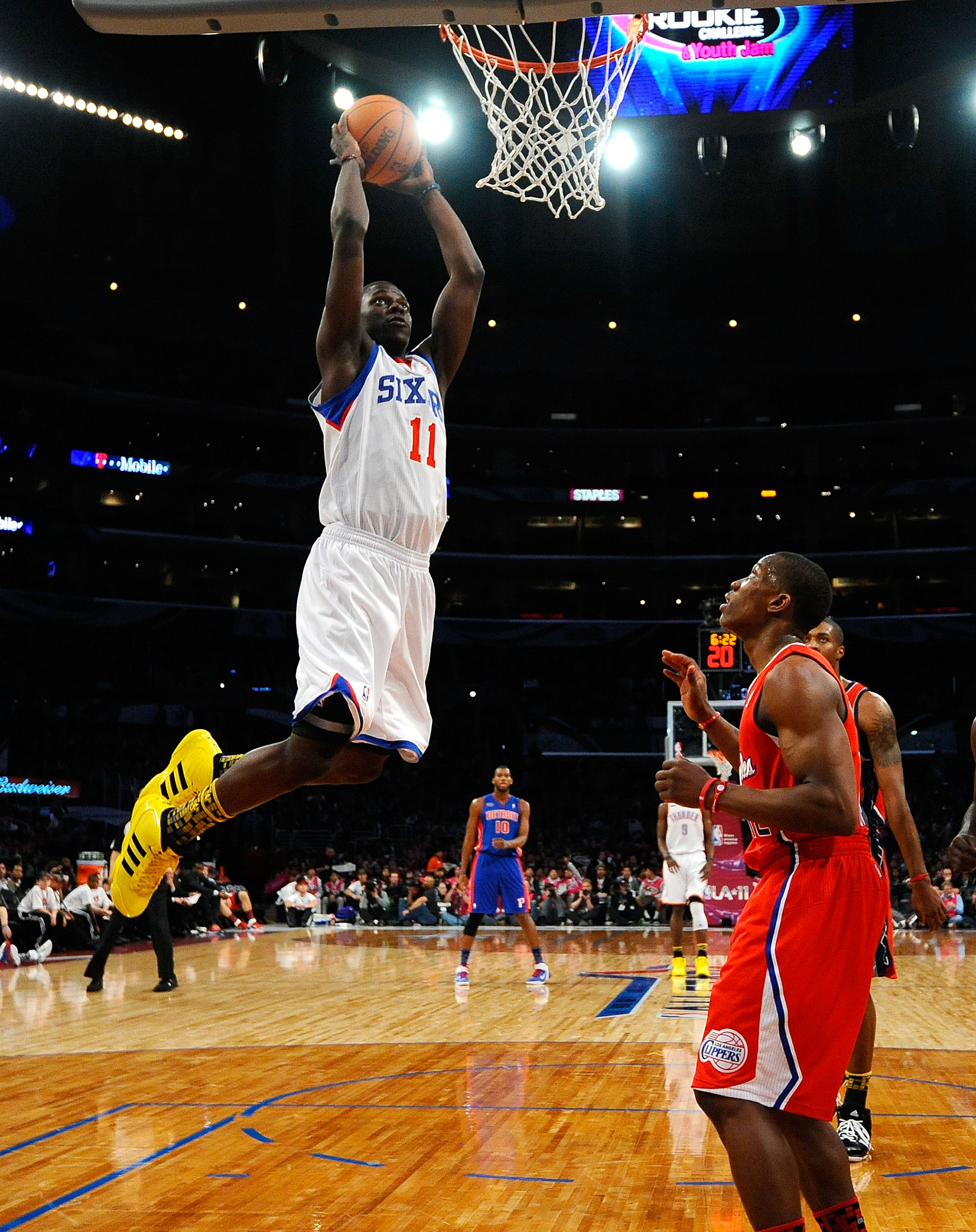 LOS ANGELES, CA - FEBRUARY 18:  Jrue Holiday #11 of the Philadelphia 76ers and the Sophomore Team dunks the ball in the first half against the Rookie Team during the T-Mobile Rookie Challenge and Youth Jam at Staples Center on February 18, 2011 in Los Ang