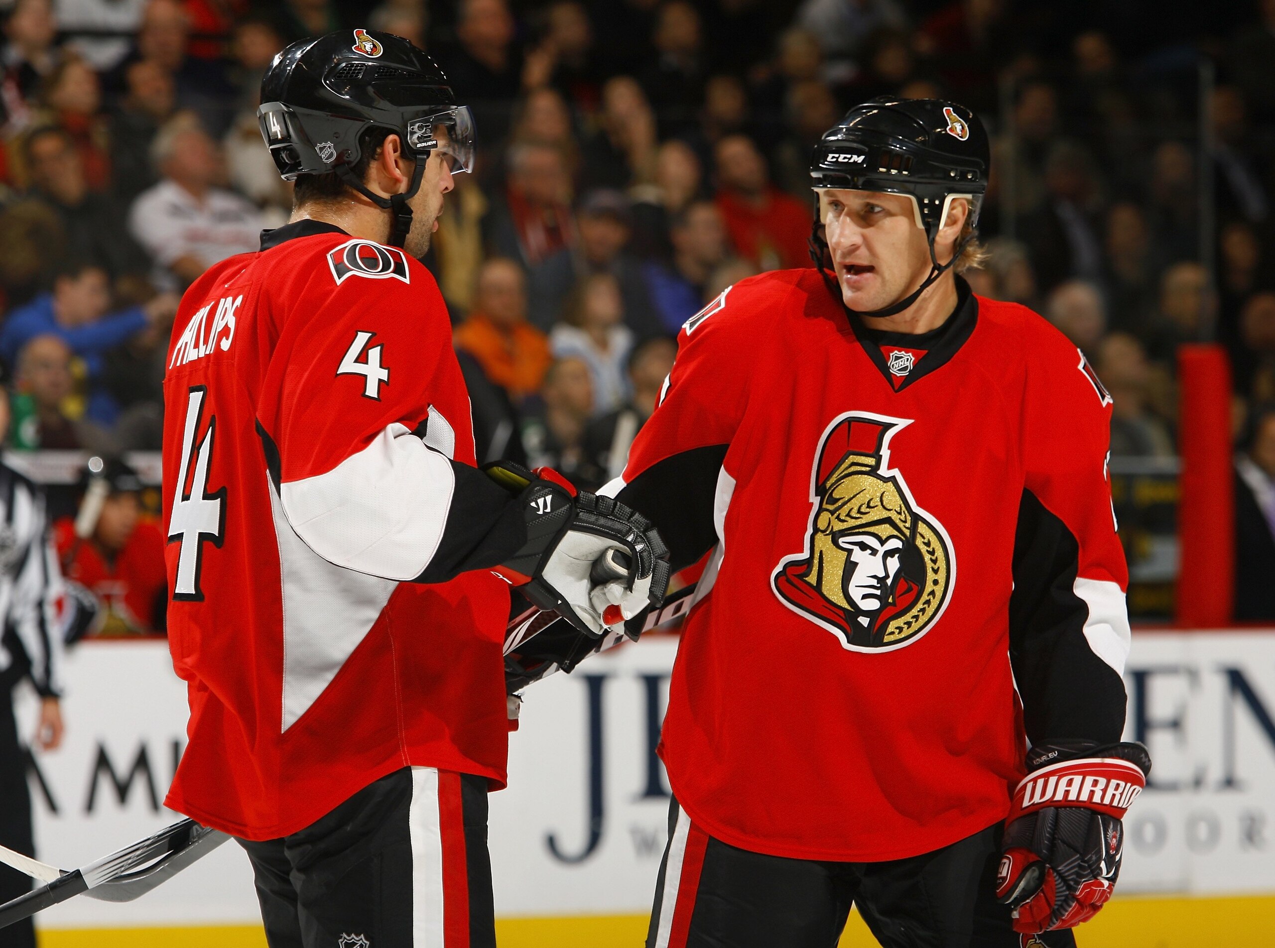 OTTAWA, ON - OCTOBER 15:  Chris Phillips#4 Alex Kovalev #27 of the Ottawa Senators talk on the ice against the Tampa Bay Lightning during a game at Scotiabank Place on October 15, 2009 in Ottawa, Canada.  The Ottawa Senators defeated the Tampa Bay Lightni