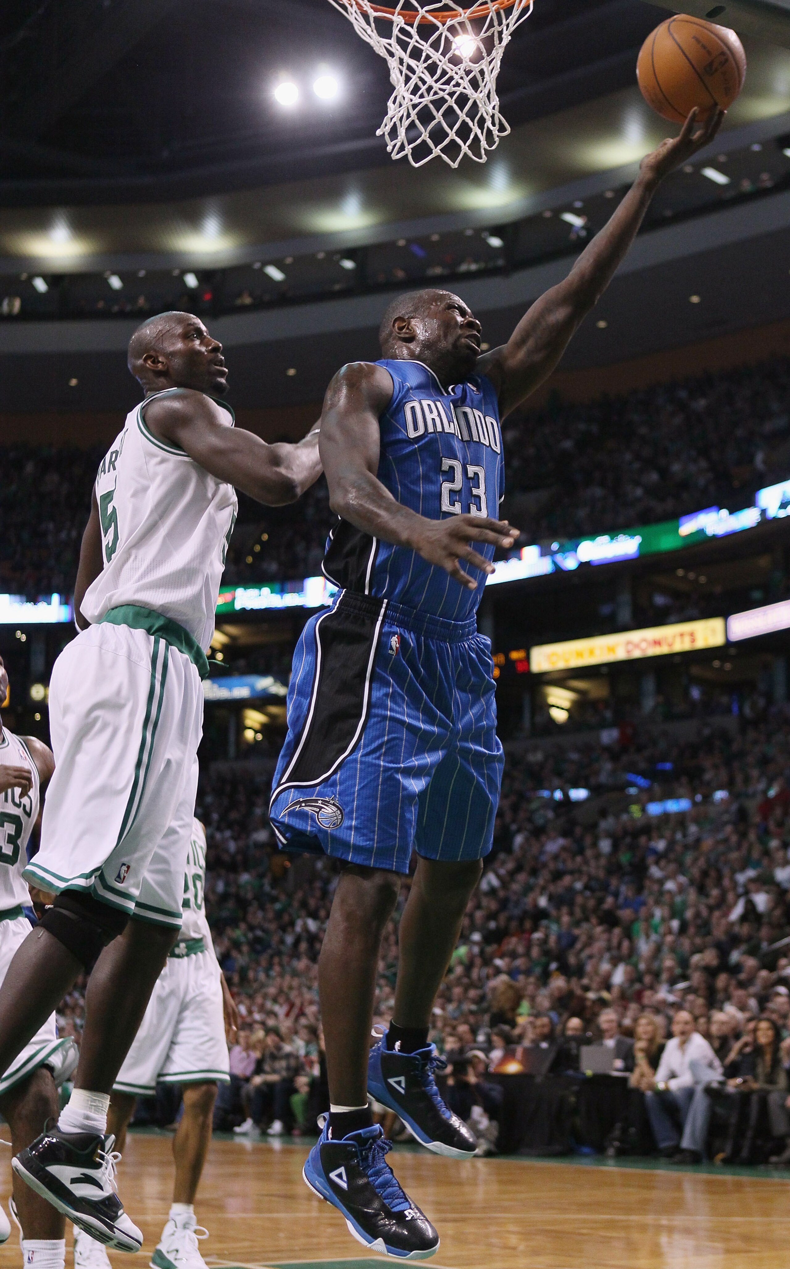 BOSTON, MA - FEBRUARY 06:  Jason Richardson #23 of the Orlando Magic takes a shot as Kevin Garnett #5 of the Boston Celtics defends on February 6, 2011 at the TD Garden in Boston, Massachusetts. The Celtics defeated the Magic 91-80. NOTE TO USER: User exp