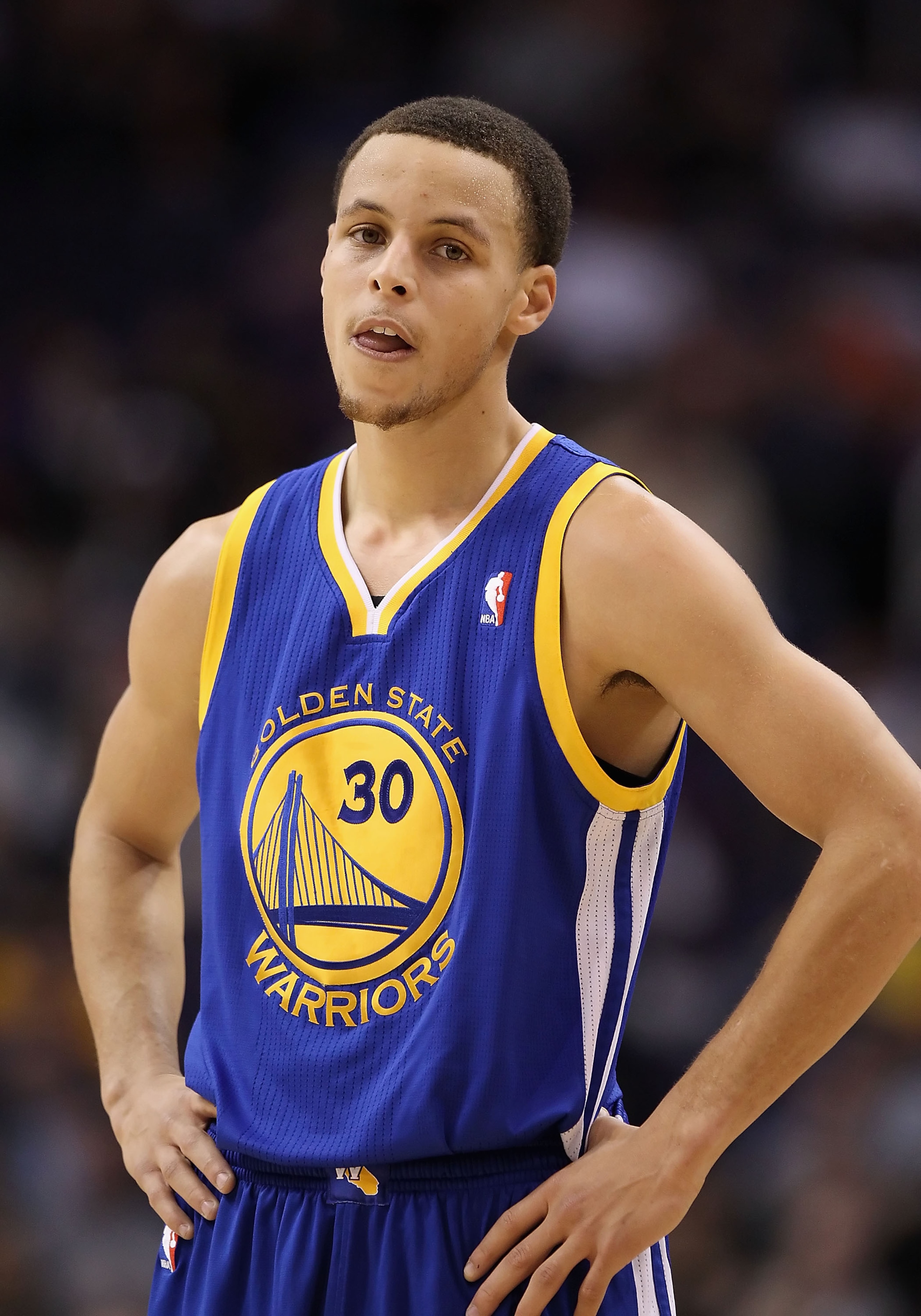 PHOENIX, AZ - FEBRUARY 10:  Stephen Curry #30 of the Golden State Warriors during the NBA game against the Phoenix Suns at US Airways Center on February 10, 2011 in Phoenix, Arizona.  The Suns defeated the Warriors 112-88.  NOTE TO USER: User expressly ac
