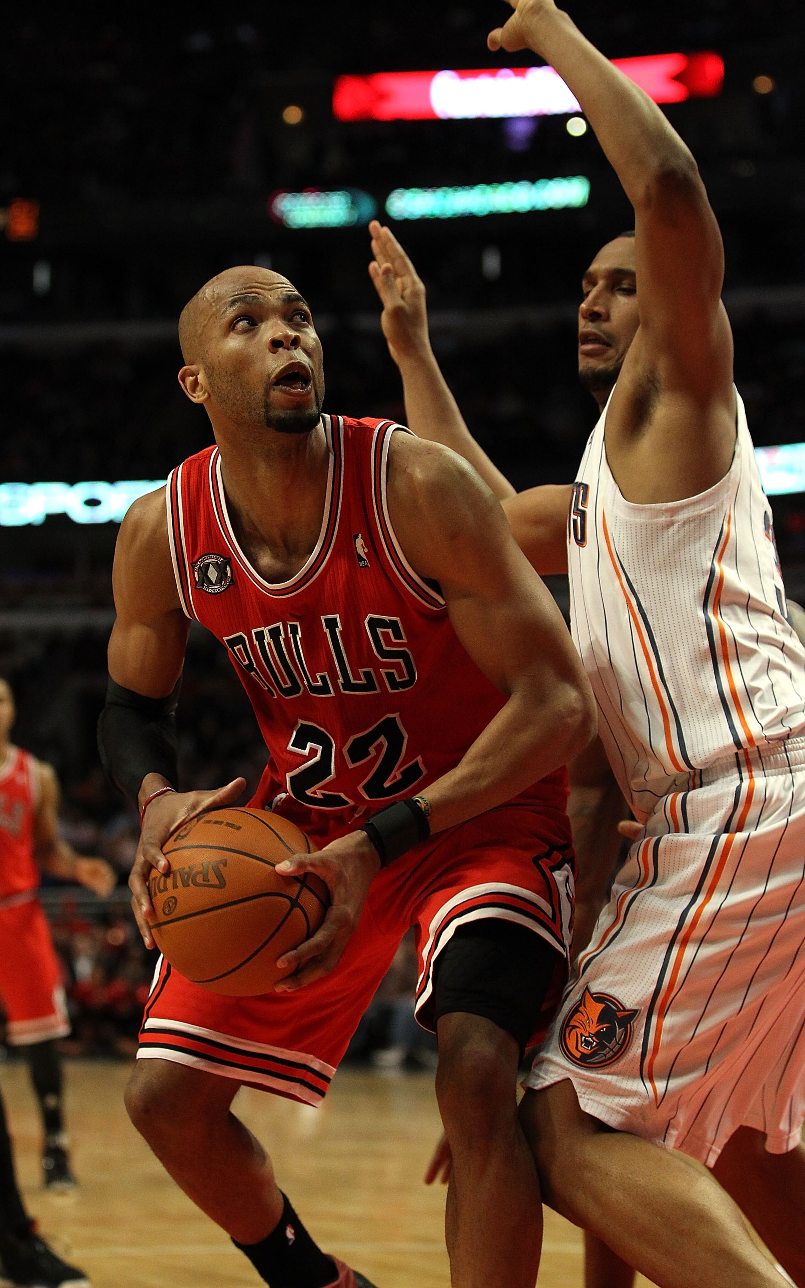 CHICAGO, IL - FEBRUARY 15: Taj Gibson #22 of the Chicago Bulls puts up a shot against Boris Diaw #32 of the Charlotte Bobcats at the United Center on February 15, 2011 in Chicago, Illinois. The Bulls defeated the Bobcats 106-94. NOTE TO USER: User express