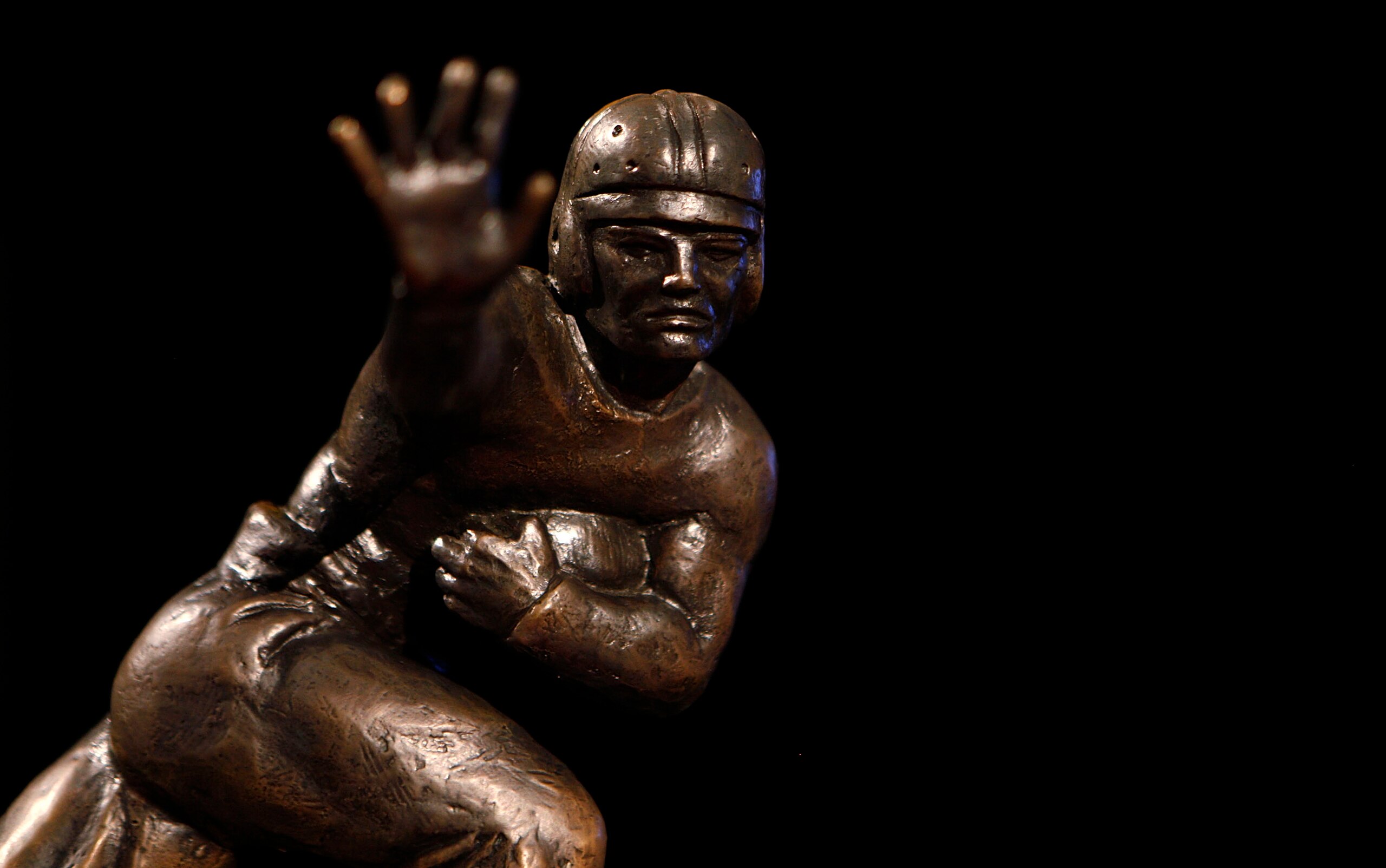 NEW YORK - DECEMBER 11: The 2010 Heisman Trophy is displayed prior to a press conference for Heisman Trophy candidates at The New York Marriott Marquis on December 11, 2010 in New York City. (Photo by Jeff Zelevansky/Getty Images) NEW YORK - DECEMBER 11: The 2010 Heisman Trophy is displayed prior to a press conference for Heisman Trophy candidates at The New York Marriott Marquis on December 11, 2010 in New York City. (Photo by Jeff Zelevansky/Getty Images)