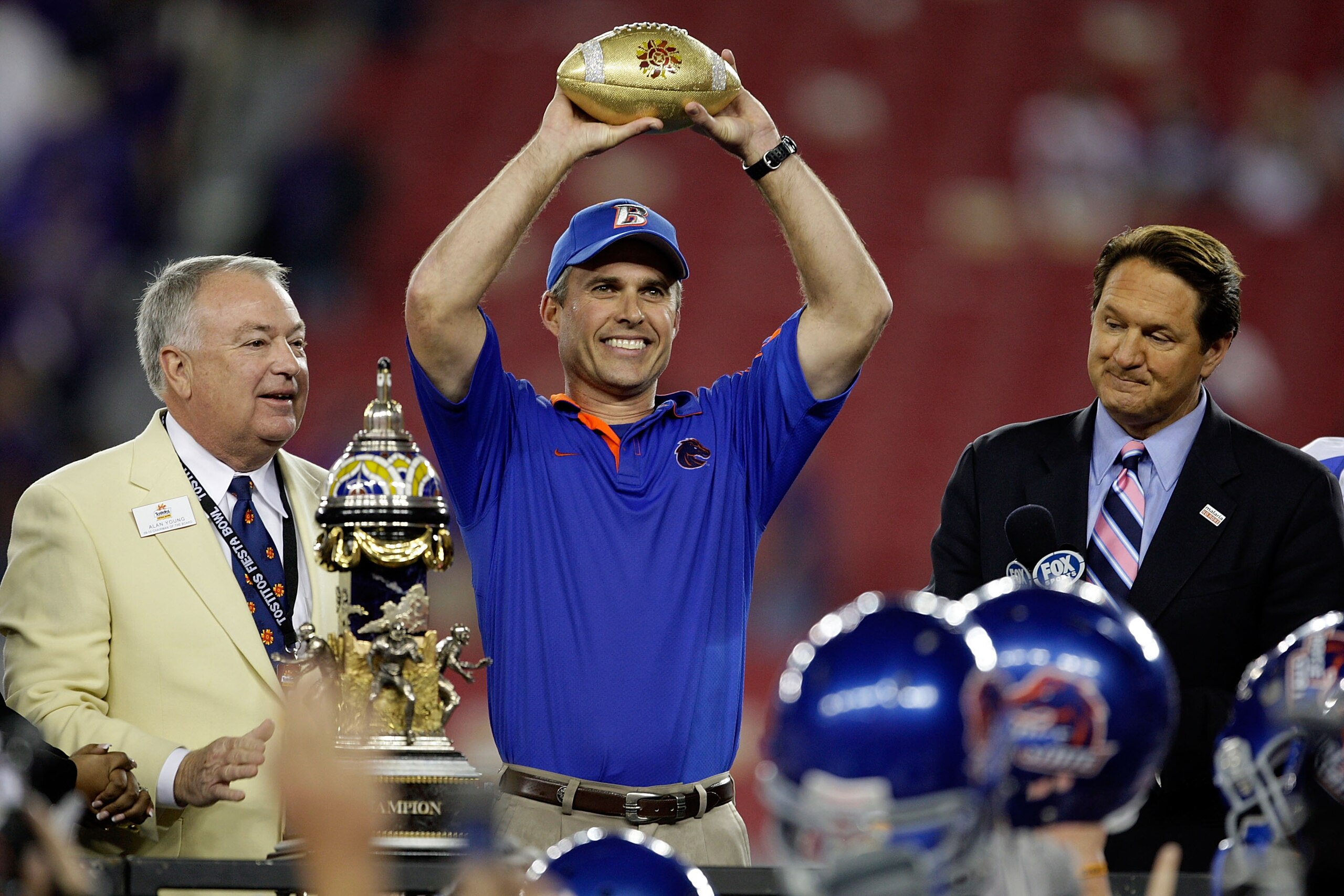 GLENDALE, AZ - JANUARY 04: Head coach Chris Petersen of the Boise State Broncos celebrates after defeating the TCU Horned Frogs 17-10 during the Tostitos Fiesta Bowl at the Universtity of Phoenix Stadium on January 4, 2010 in Glendale, Arizona. (Photo b GLENDALE, AZ - JANUARY 04: Head coach Chris Petersen of the Boise State Broncos celebrates after defeating the TCU Horned Frogs 17-10 during the Tostitos Fiesta Bowl at the Universtity of Phoenix Stadium on January 4, 2010 in Glendale, Arizona. (Photo b