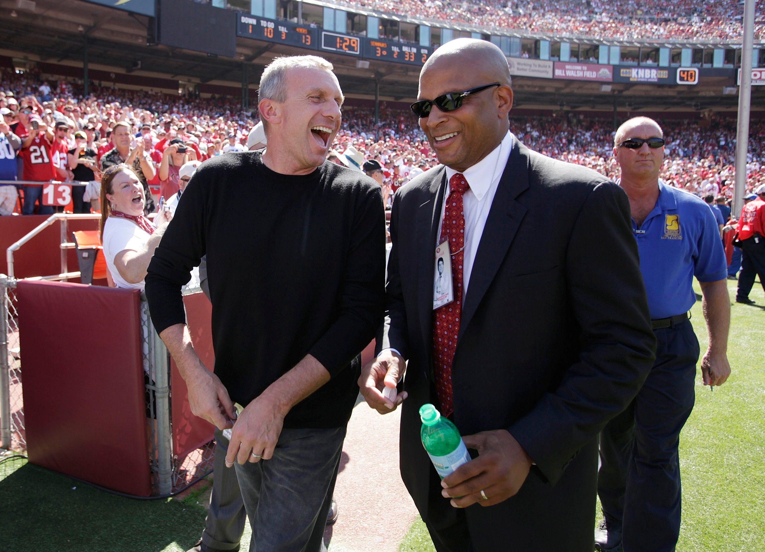 SAN FRANCISCO - SEPTEMBER 20:  Former San Francisco 49ers quarterback Joe Montana has a laugh with former San Francisco 49er Ronnie Lott during home opener as the San Francisco 49ers host the Seattle Seahawks at Candlestick Park September 20, 2009 in San