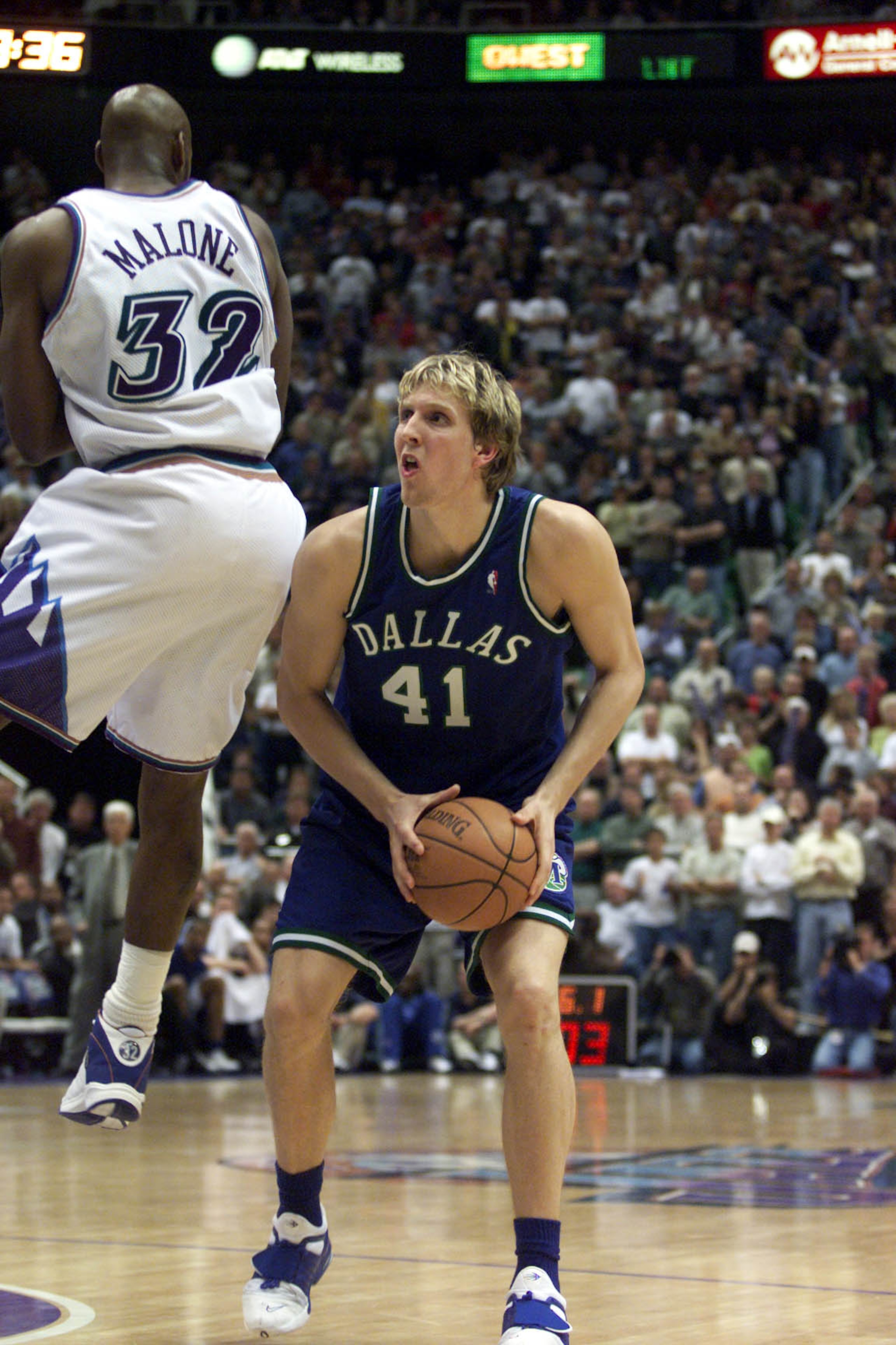 21 Apr 2001:  Dirk Nowitzki #41 of the Dallas Mavericks in action against Karl Malone #32 of the Utah Jazz during game one of the NBA playoffs at the Delta Center in Salt Lake City, Utah.  The Jazz won 88-86.  DIGITAL IMAGE.  Mandatory Credit: Brian Bahr/