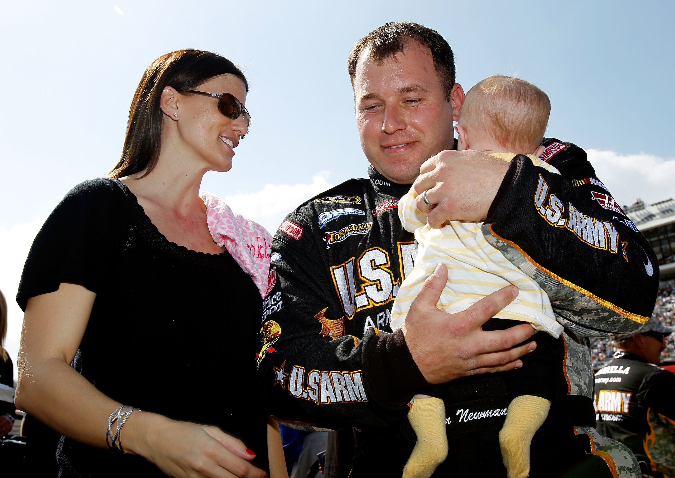 DAYTONA BEACH, FL - FEBRUARY 17:  Ryan Newman, driver of the #39 U.S. Army Chevrolet, his wife Krissie Newman and their daughter Brooklyn Sage Newman stand on the grid prior to the first race of the NASCAR Sprint Cup Series Gatorade Duel at Daytona Intern