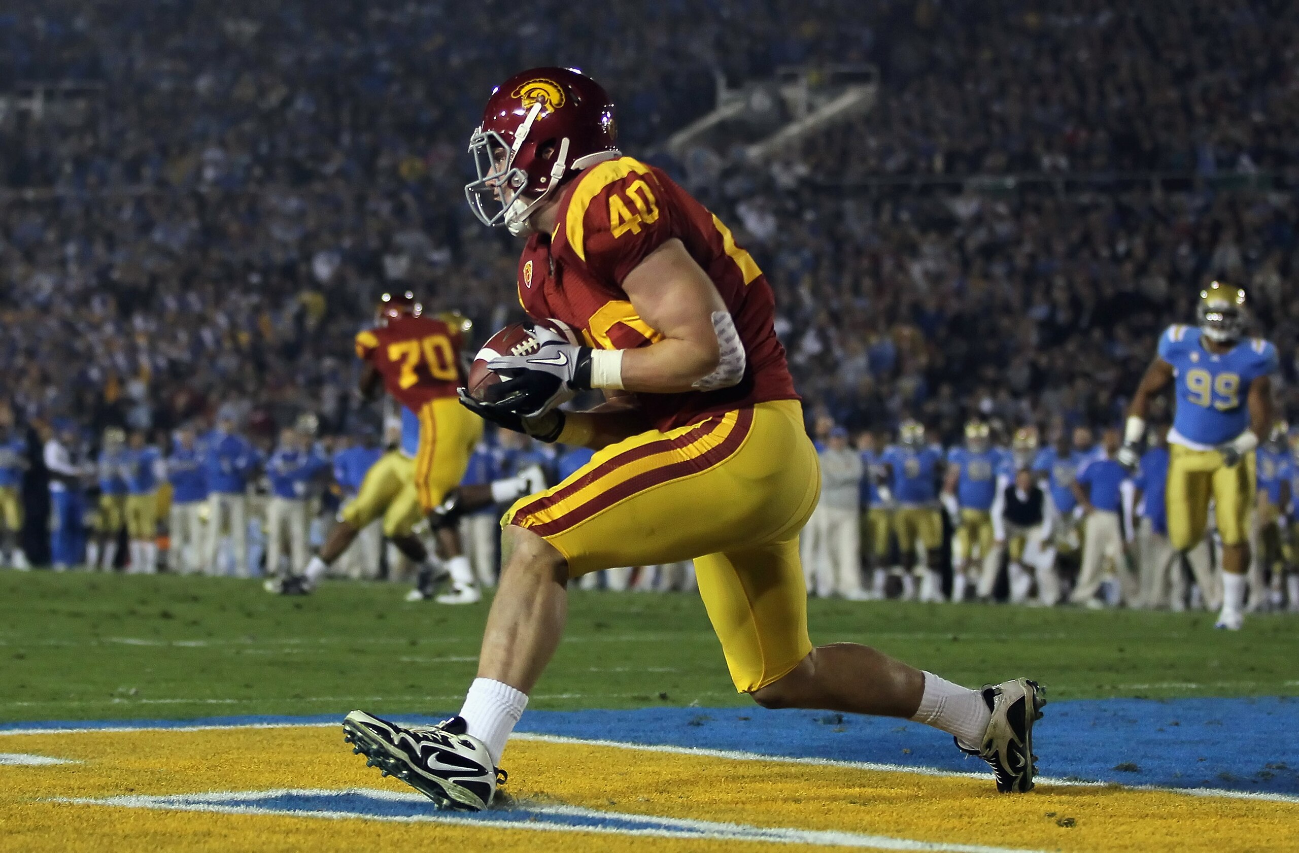 PASADENA, CA - DECEMBER 04: Tight end Rhett Ellison #30 of the USC Trojans catches a pass for touchdown in the first quarter against the UCLA Bruins at the Rose Bowl on December 4, 2010 in Pasadena, California. (Photo by Jeff Gross/Getty Images) PASADENA, CA - DECEMBER 04: Tight end Rhett Ellison #30 of the USC Trojans catches a pass for touchdown in the first quarter against the UCLA Bruins at the Rose Bowl on December 4, 2010 in Pasadena, California. (Photo by Jeff Gross/Getty Images)