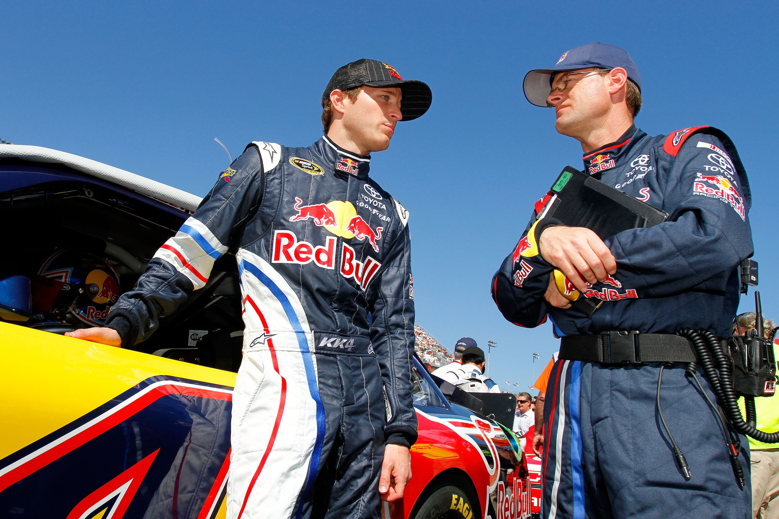 DAYTONA BEACH, FL - FEBRUARY 20:  Kasey Kahne, driver of the #4 Red Bull Toyota, talks to his crew chief Kenny Francis on the grid prior to the NASCAR Sprint Cup Series Daytona 500 at Daytona International Speedway on February 20, 2011 in Daytona Beach, F