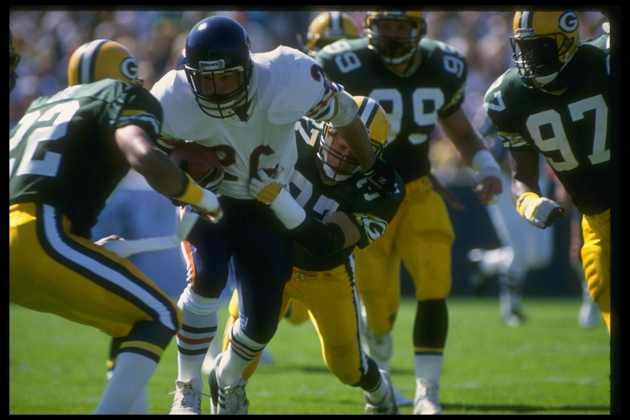 25 Sep 1988: Running back Matt Suhey of the Chicago Bears (center) moves down the field during a game against the Green Bay Packers at Lambeau Field in Green Bay, Wisconsin. The Bears won the game, 24-6.