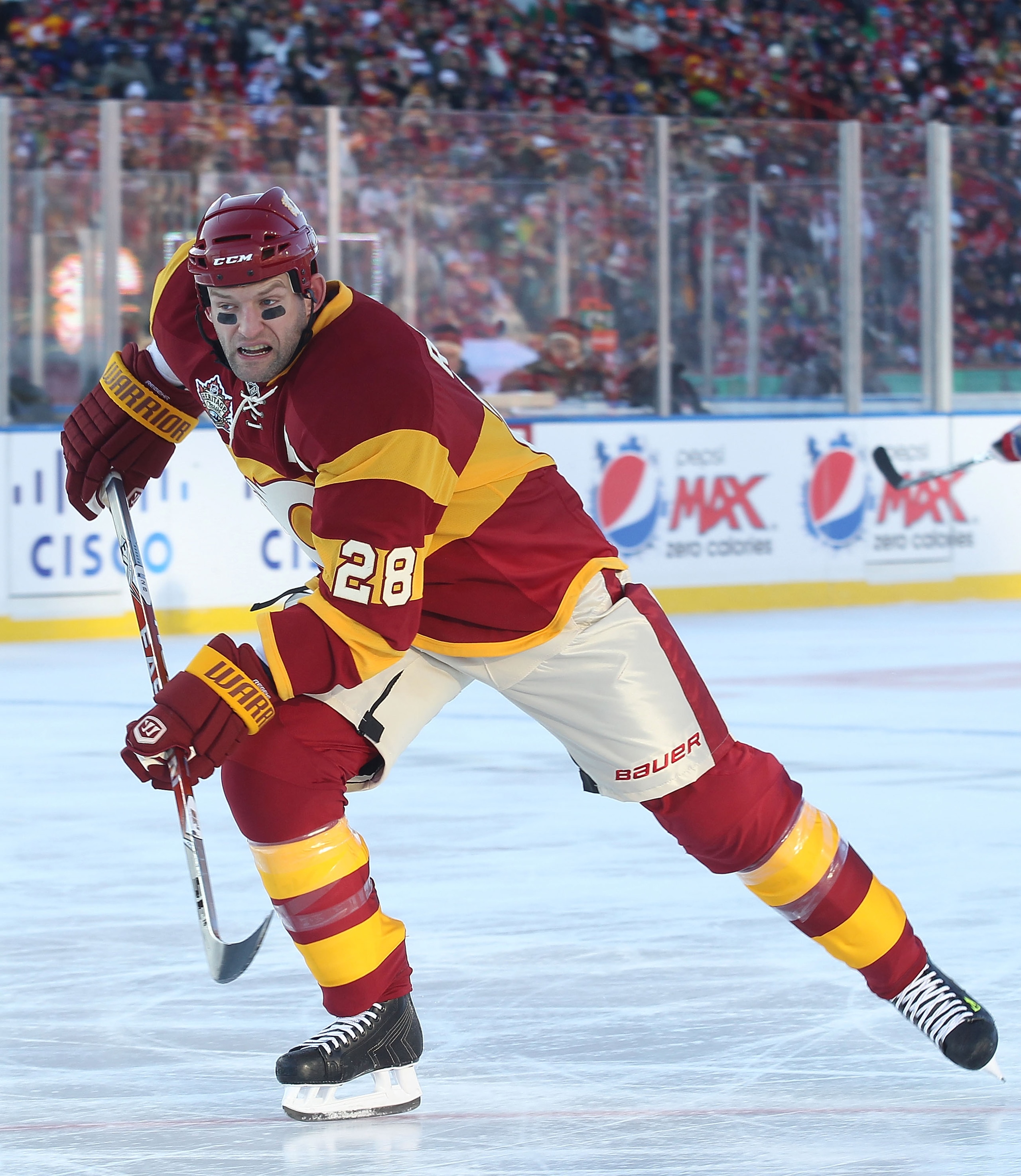 CALGARY, AB - FEBRUARY 20:  Robyn Regehr #28 of the Calgary Flames skates against the Montreal Canadiens during the 2011 NHL Heritage Classic Game at McMahon Stadium on February 20, 2011 in Calgary, Alberta, Canada.  (Photo by Andre Ringuette/Getty Images