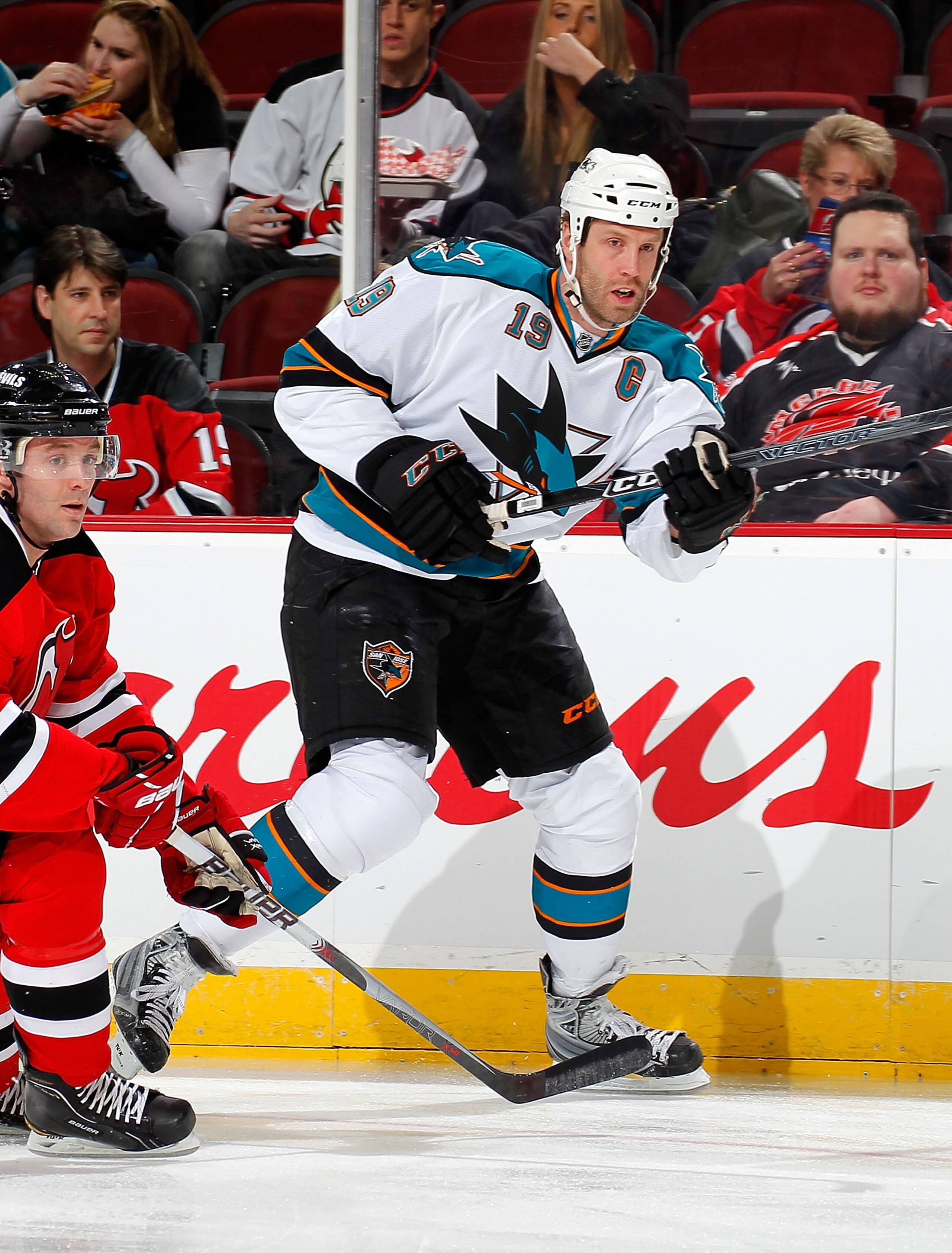 NEWARK, NJ - FEBRUARY 11: Joe Thornton #19 of the San Jose Sharks passes in an NHL hockey game against the New Jersey Devils on February 11, 2011 at the Prudential Center in Newark, New Jersey. (Photo by Paul Bereswill/Getty Images)