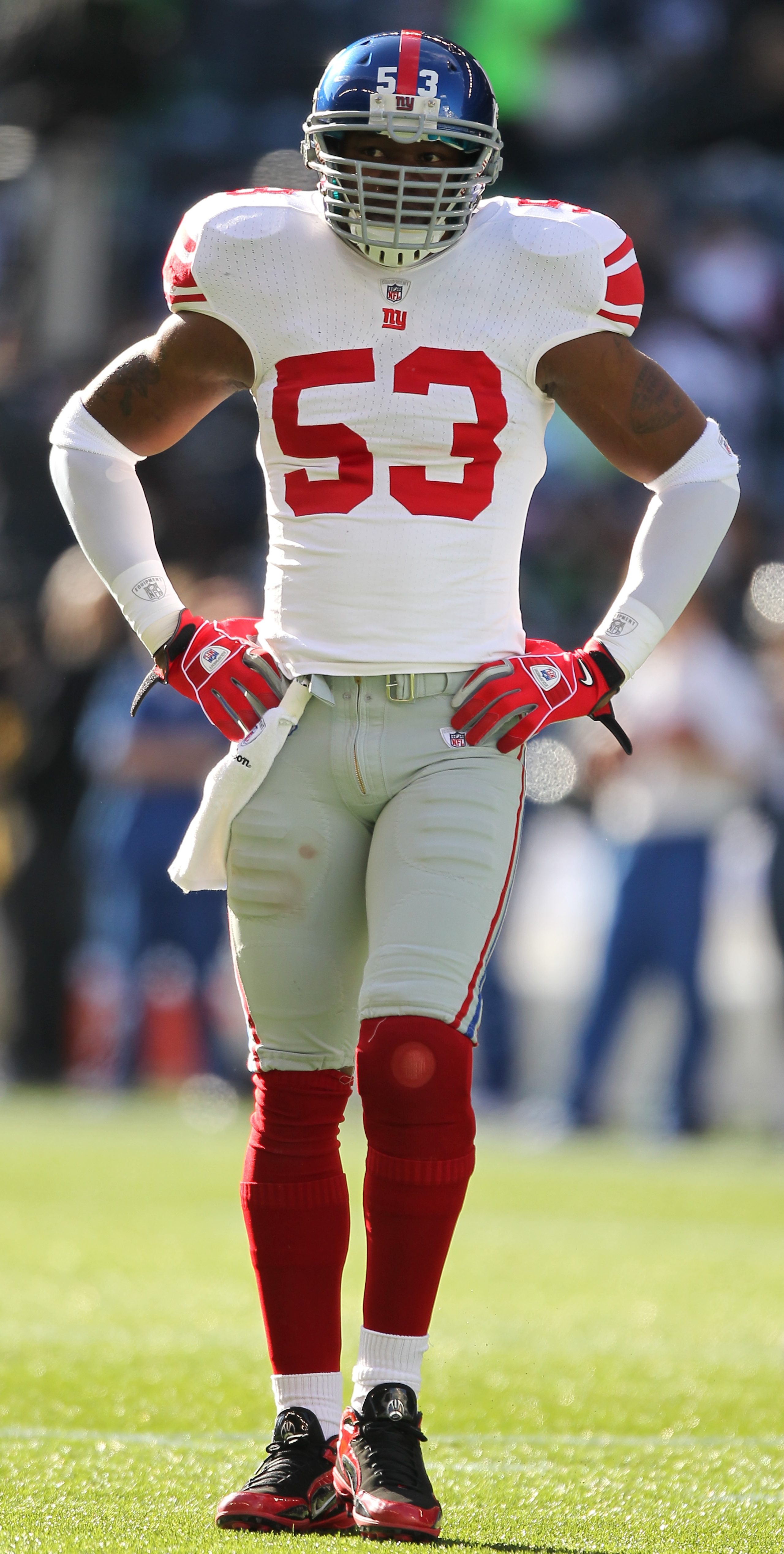 SEATTLE - NOVEMBER 07:  Linebacker Keith Bulluck #53 of the New York Giants looks on during warmups prior to the game against the Seattle Seahawks at Qwest Field on November 7, 2010 in Seattle, Washington. The Giants defeated the Seahawks 41-7. (Photo by