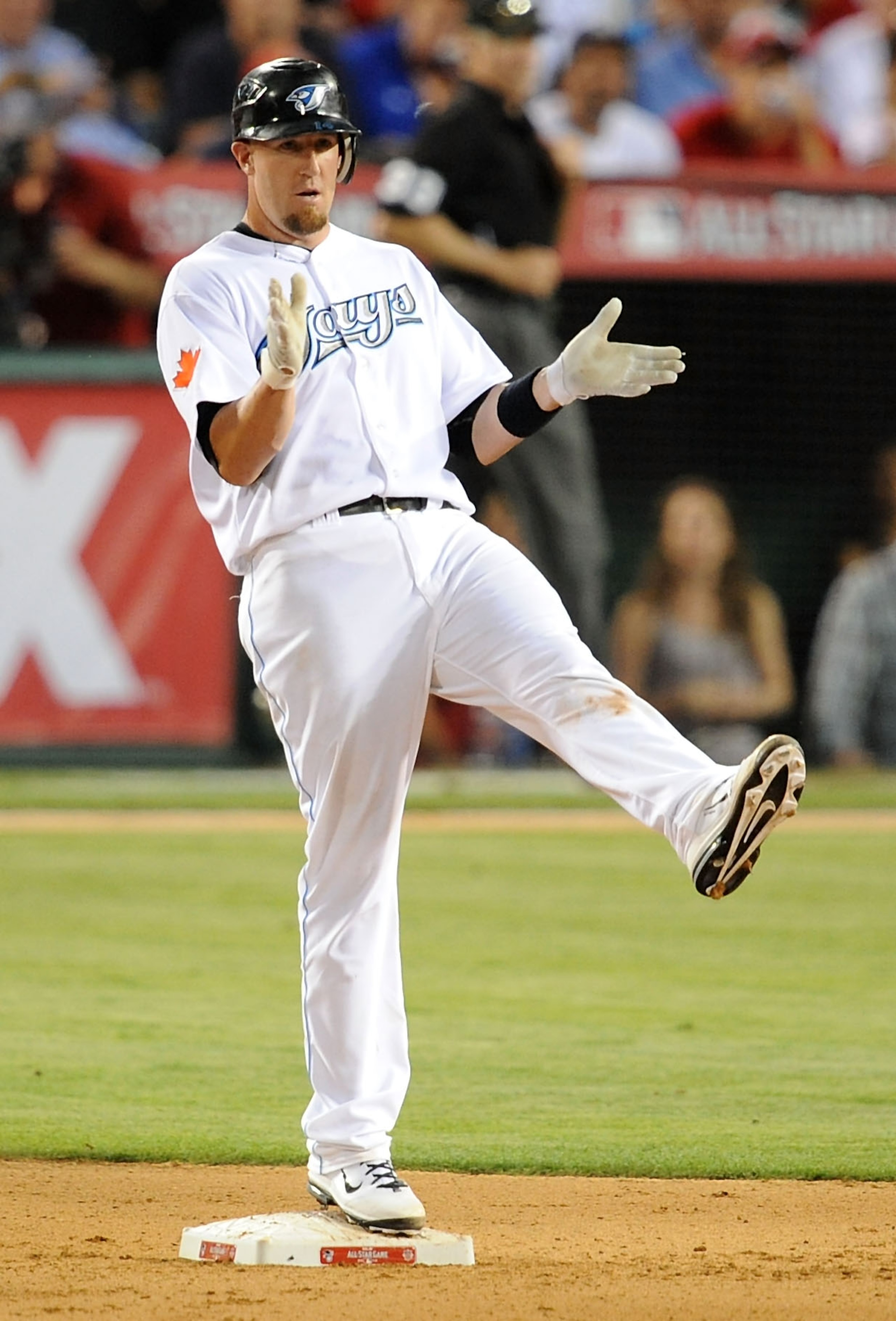 ANAHEIM, CA - JULY 13:  American League All-Star John Buck #14 of the Toronto Blue Jays doubles in the seventh inning during the 81st MLB All-Star Game at Angel Stadium of Anaheim on July 13, 2010 in Anaheim, California.  (Photo by Lisa Blumenfeld/Getty I