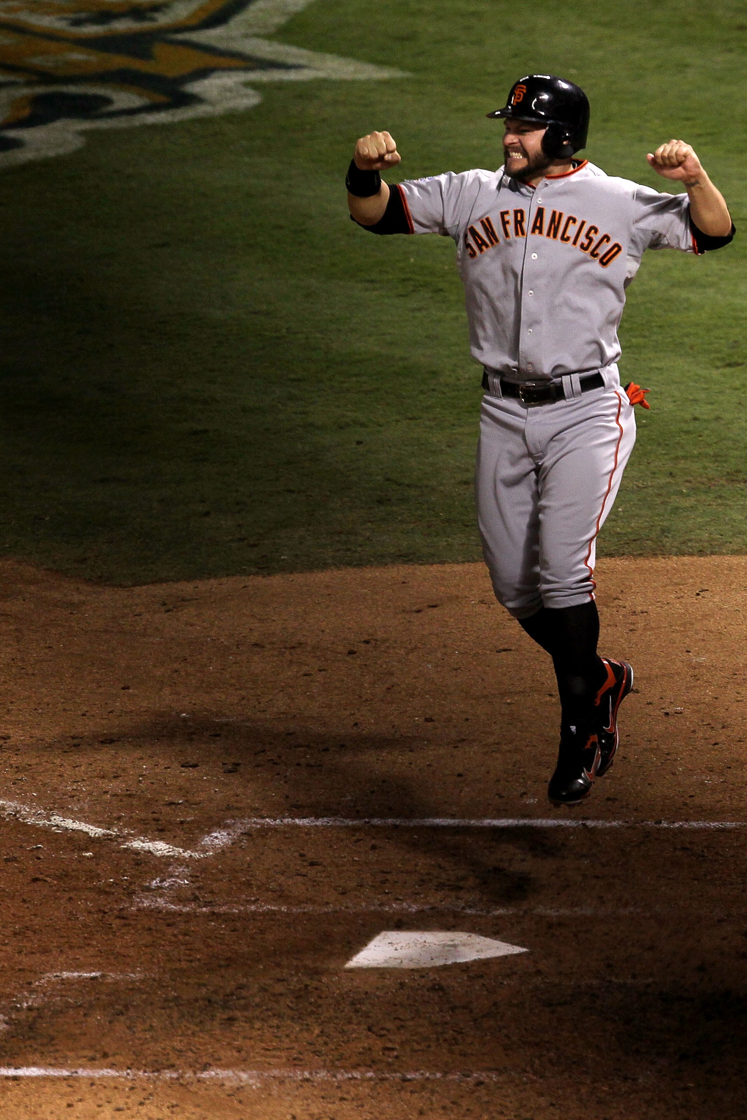 ARLINGTON, TX - NOVEMBER 01:  Cody Ross #13 of the San Francisco Giants celebrates after he scored on a 3-run home run hit by Edgar Renteria #16 in the seventh inning against the Texas Rangers in Game Five of the 2010 MLB World Series at Rangers Ballpark