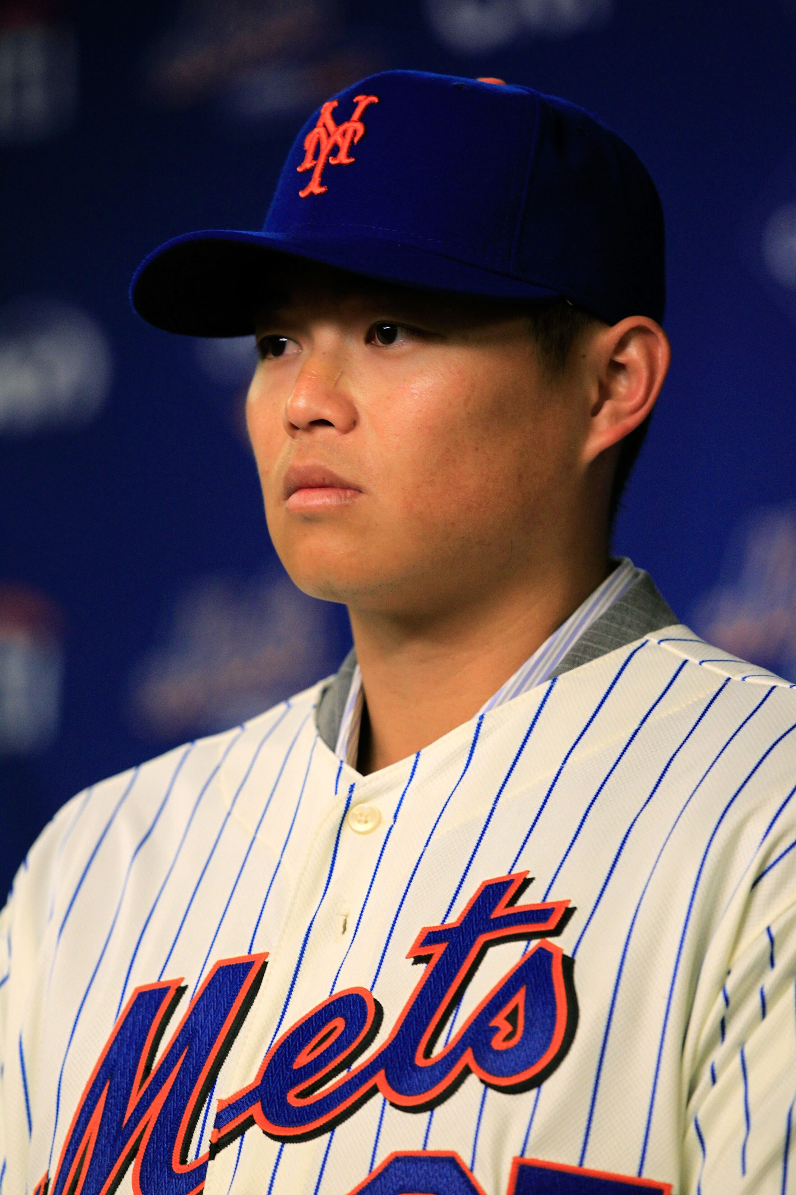 NEW YORK, NY - JANUARY 26:  Chin-lung Hu talks to the media during a press conference to announce his signing to the New York Mets at Citi Field on January 26, 2011 in the Flushing neighborhood, of the Queens borough of New York City.  (Photo by Chris Tro