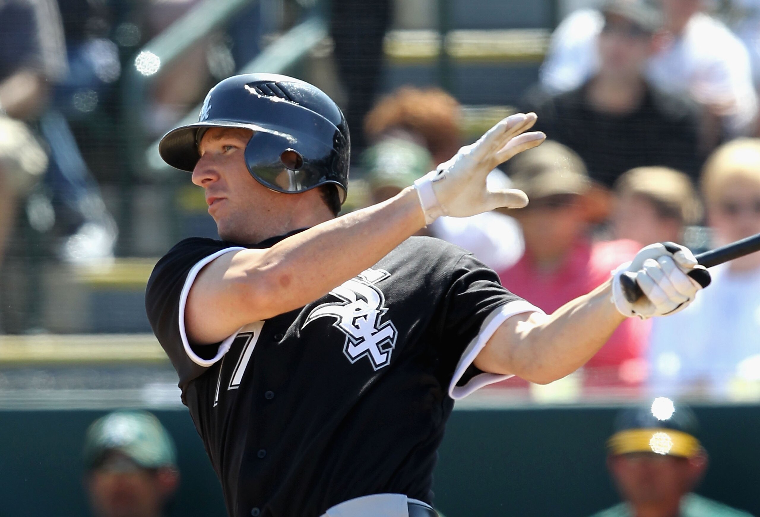 PHOENIX - MARCH 10:  Brent Morel #77 of the Chicago White Sox at bat during the MLB spring training game against the Oakland Athletics at Phoenix Municipal Stadium on March 10, 2010 in Phoenix, Arizona.  The White Sox defeated the A's 9-5.  (Photo by Chri