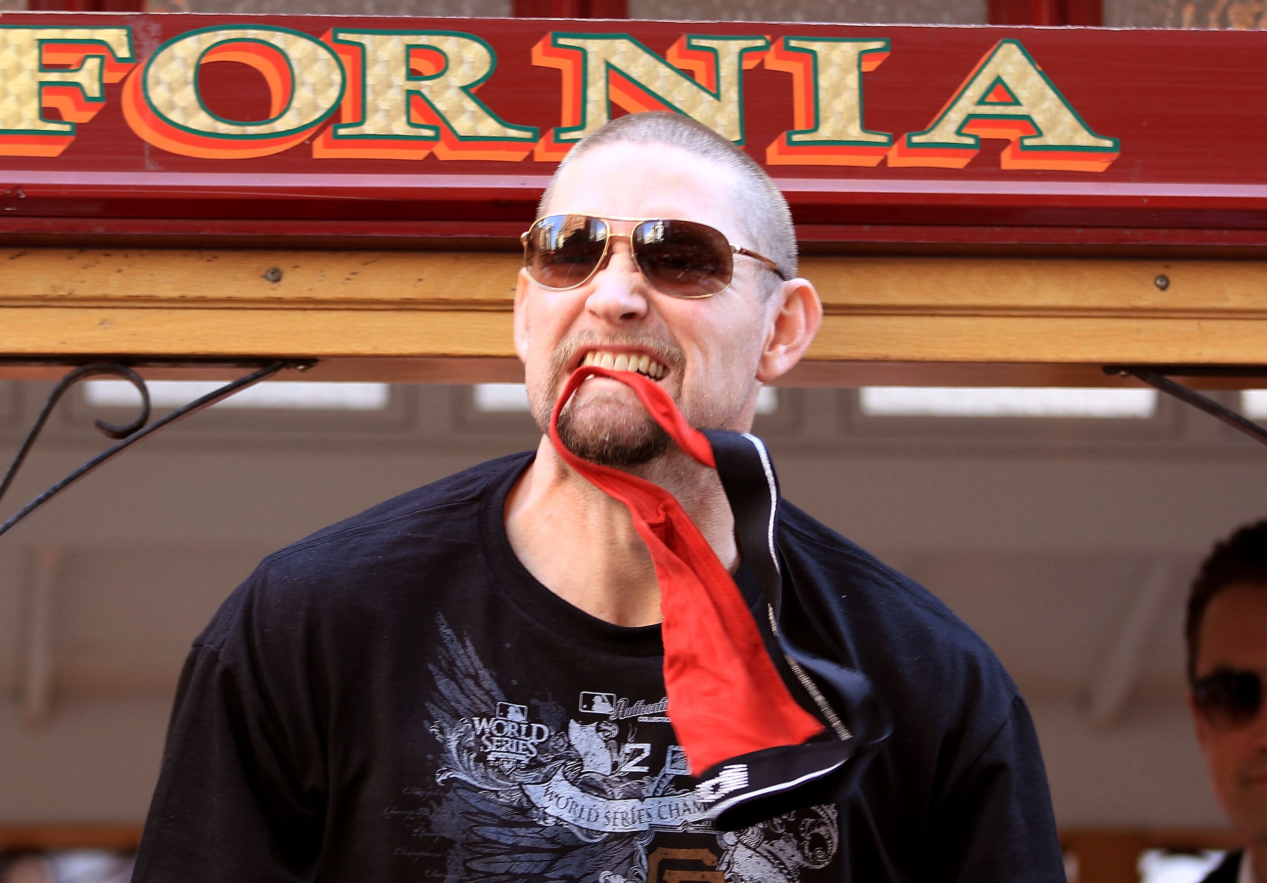 SAN FRANCISCO - NOVEMBER 03:  Aubrey Huff of the San Francisco Giants bites his red rally thong during the San Francisco Giants victory parade on November 3, 2010 in San Francisco, California.  (Photo by Ezra Shaw/Getty Images)