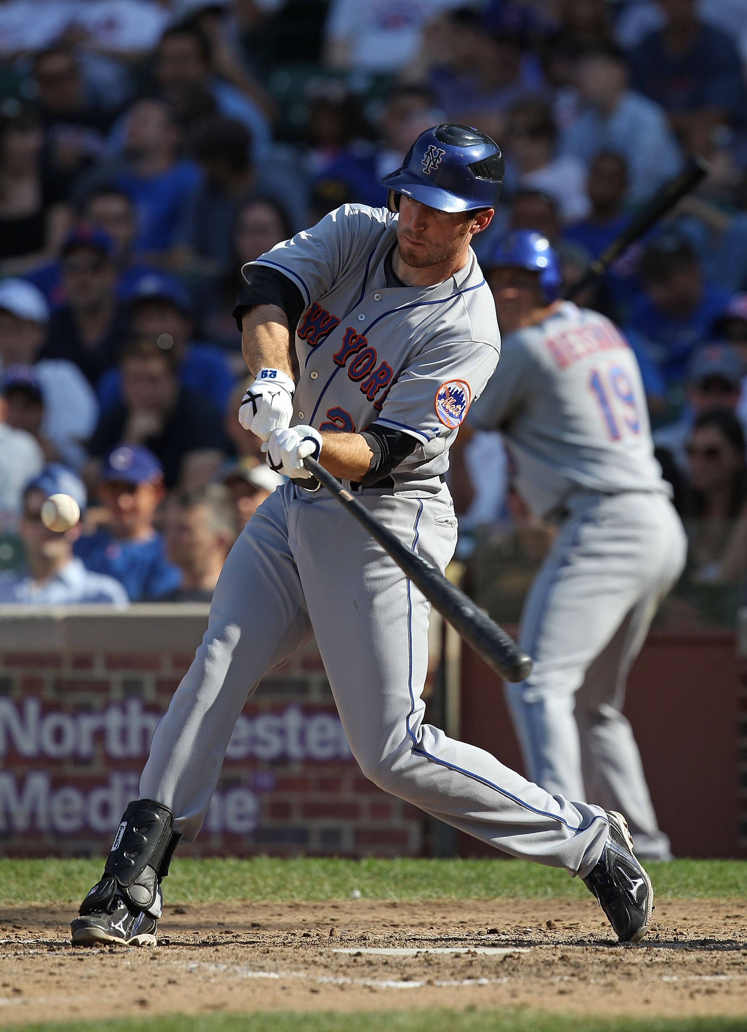 CHICAGO - SEPTEMBER 05: Ike Davis #29 of the New York Mets takes a swing against the Chicago Cubs at Wrigley Field on September 5, 2010 in Chicago, Illinois. The Mets defeated the Cubs 18-5.  (Photo by Jonathan Daniel/Getty Images)
