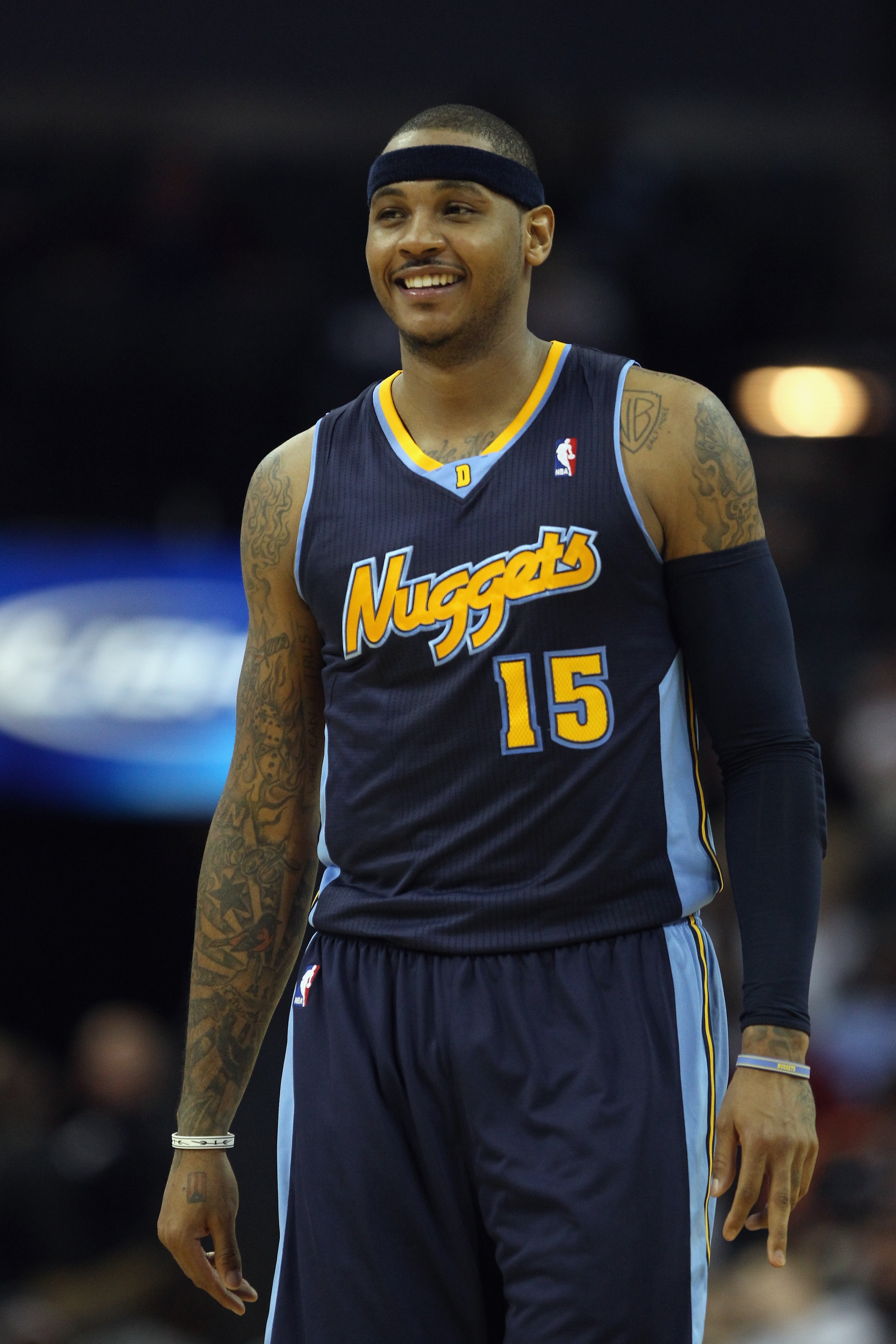 CHARLOTTE, NC - DECEMBER 07:  Carmelo Anthony #15 of the Denver Nuggets watches on against the Charlotte Bobcats during their game at Time Warner Cable Arena on December 7, 2010 in Charlotte, North Carolina.  NOTE TO USER: User expressly acknowledges and