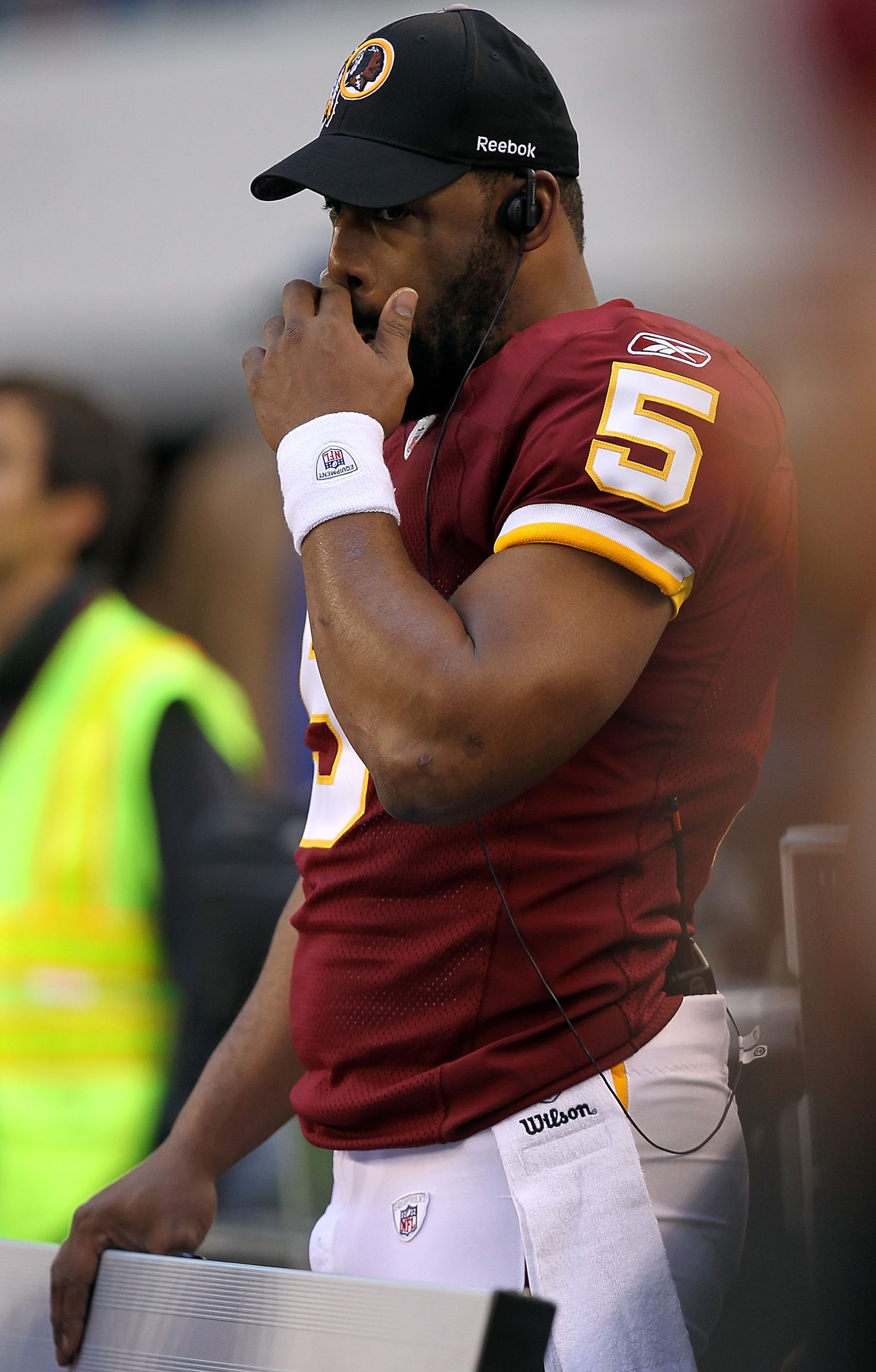 ARLINGTON, TX - DECEMBER 19:  Quarterback Donovan McNabb #5  of the Washington Redskins on the sidelines against play against the Dallas Cowboys at Cowboys Stadium on December 19, 2010 in Arlington, Texas.  (Photo by Ronald Martinez/Getty Images)