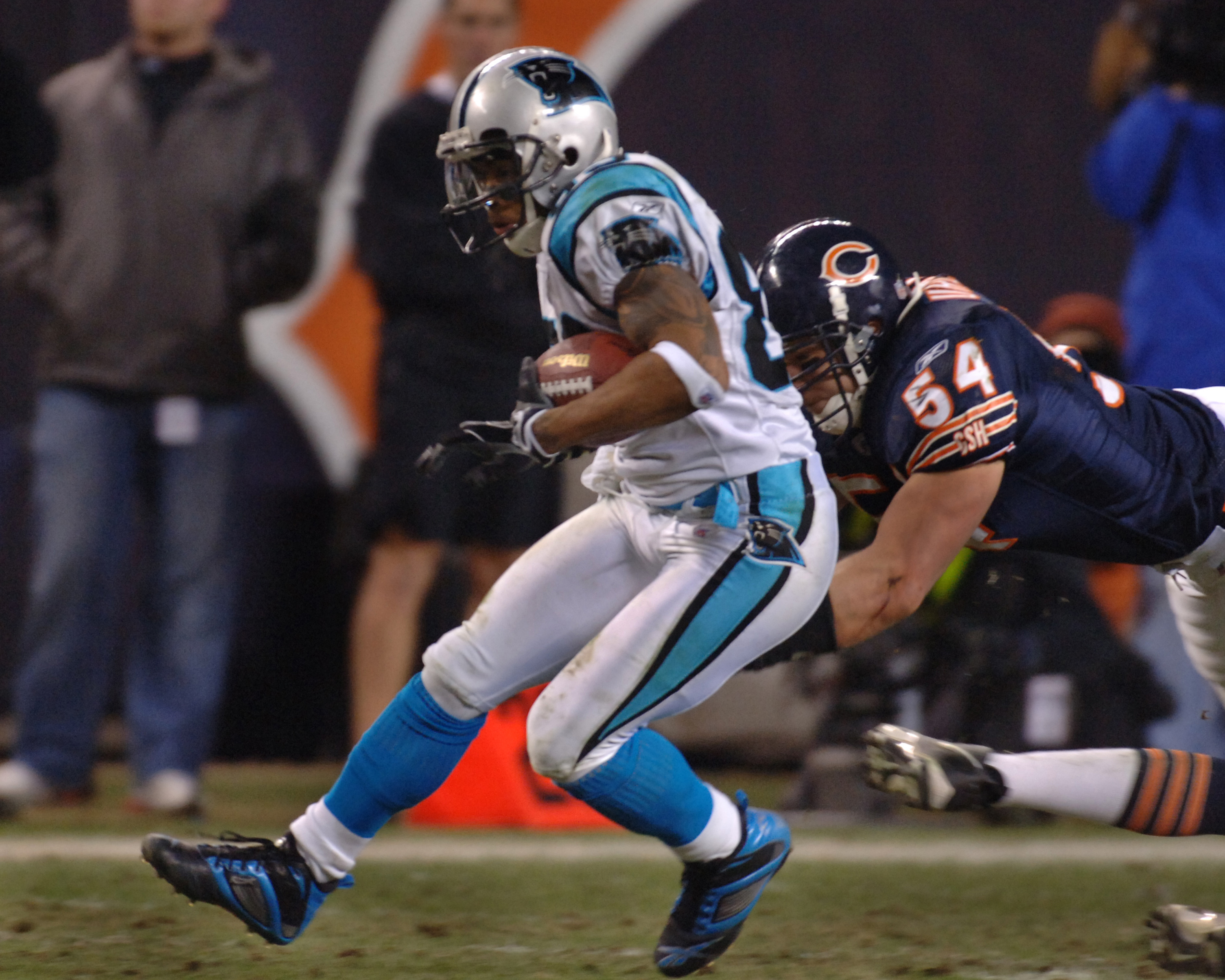 Chicago Bears wide receiver Devin Hester (23) is run into and tackled by  teammate guard Edwin Williams (70) during first half NFL action between the  New York Giants and Chicago Bears at