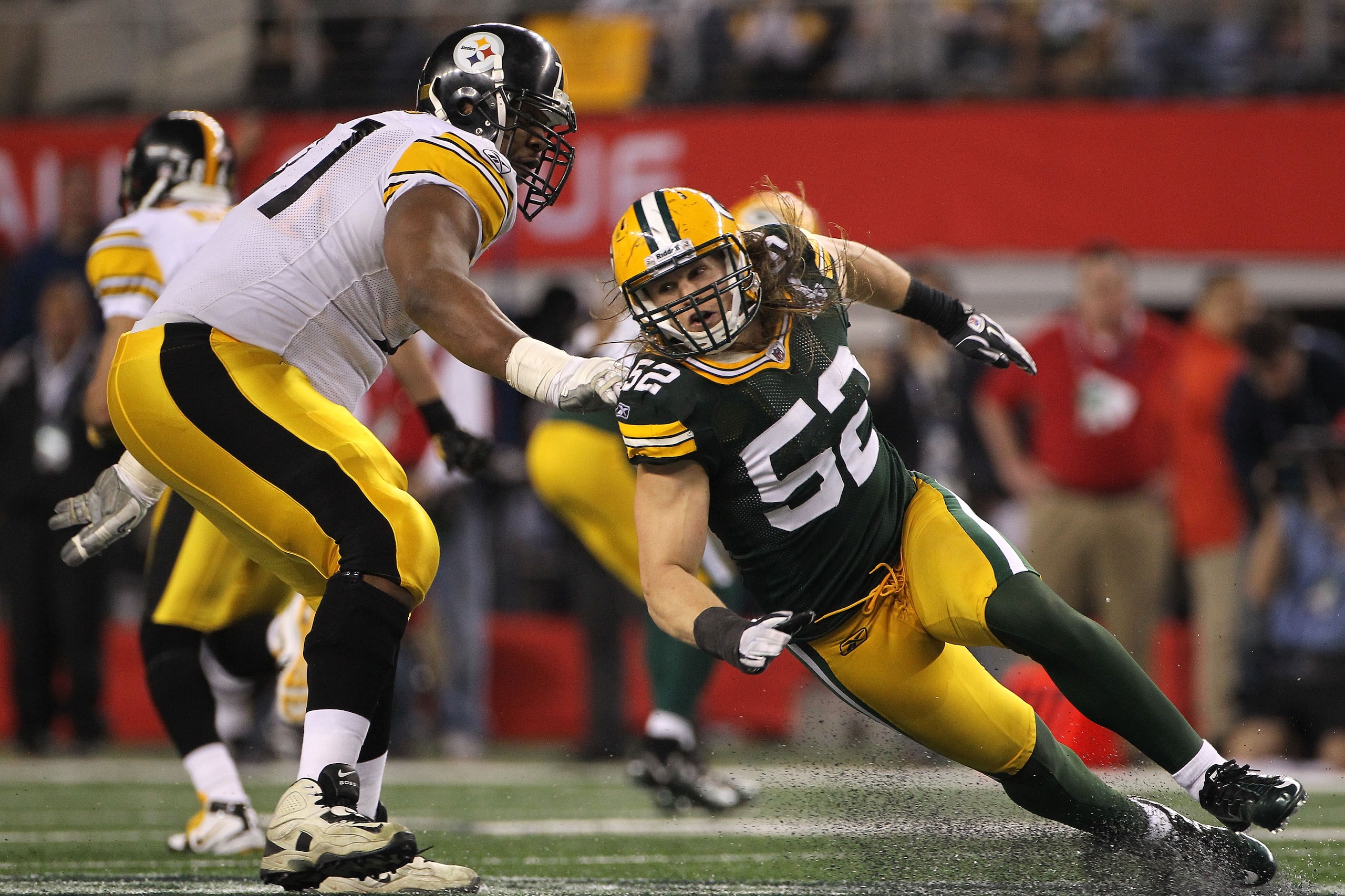 ARLINGTON, TX - FEBRUARY 06:  Clay Matthews #52 of the Green Bay Packers rushes in past Flozell Adams #71 of the Pittsburgh Steelers in the second half during Super Bowl XLV at Cowboys Stadium on February 6, 2011 in Arlington, Texas.  (Photo by Doug Pensi