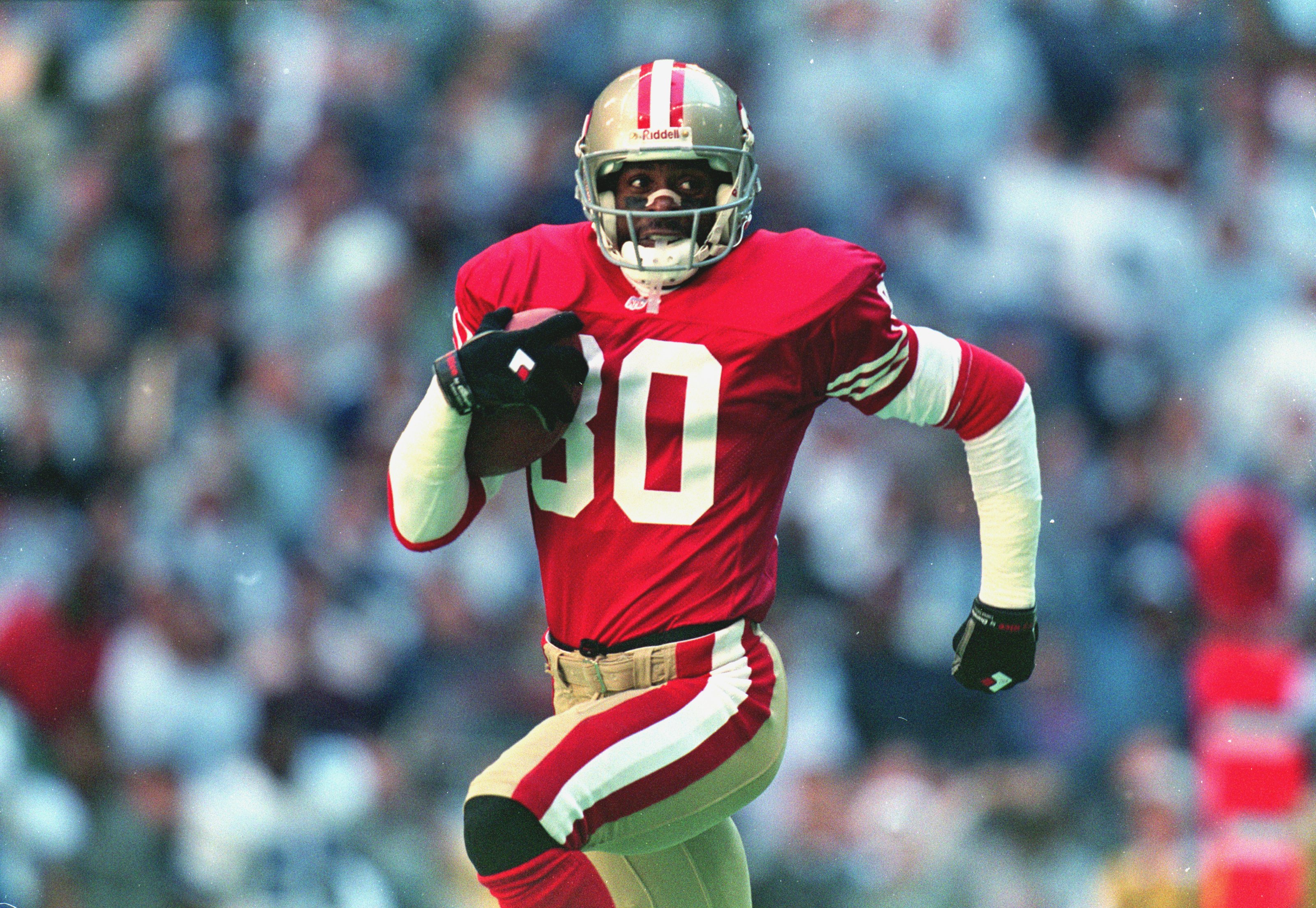12 Nov 1995: Jerry Rice #80 of the San Francisco 49ers runs for a touch down during the game against the Dallas Cowboys at the Texas Stadium in Irving, Texas. The 49ers defeated the Cowboys 38-20.
