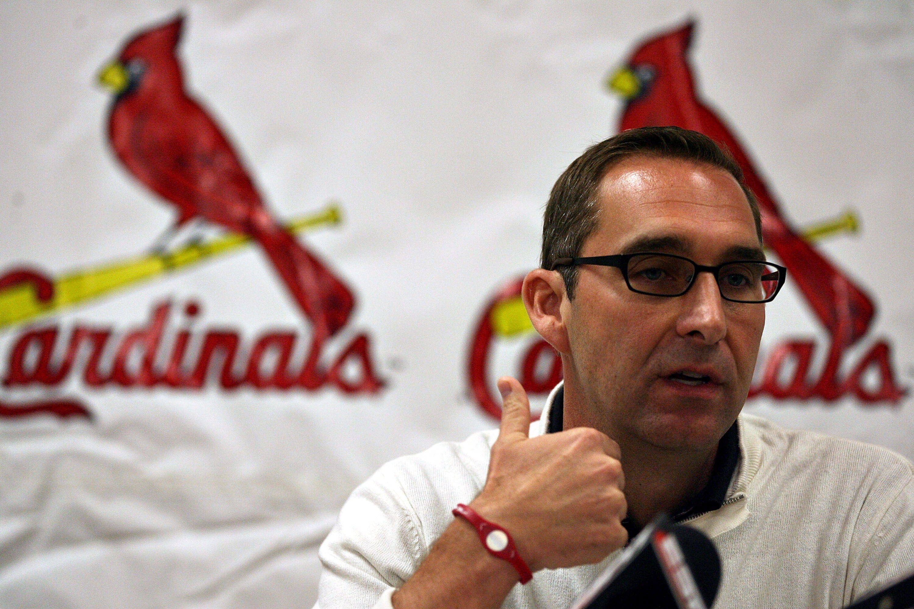 JUPITER, FL - FEBRUARY 16:  General Manager John Mozeliak of the St. Louis Cardinals speaks at a press conference at Roger Dean Stadium on February 16, 2011 in Jupiter, Florida.  (Photo by Marc Serota/Getty Images)