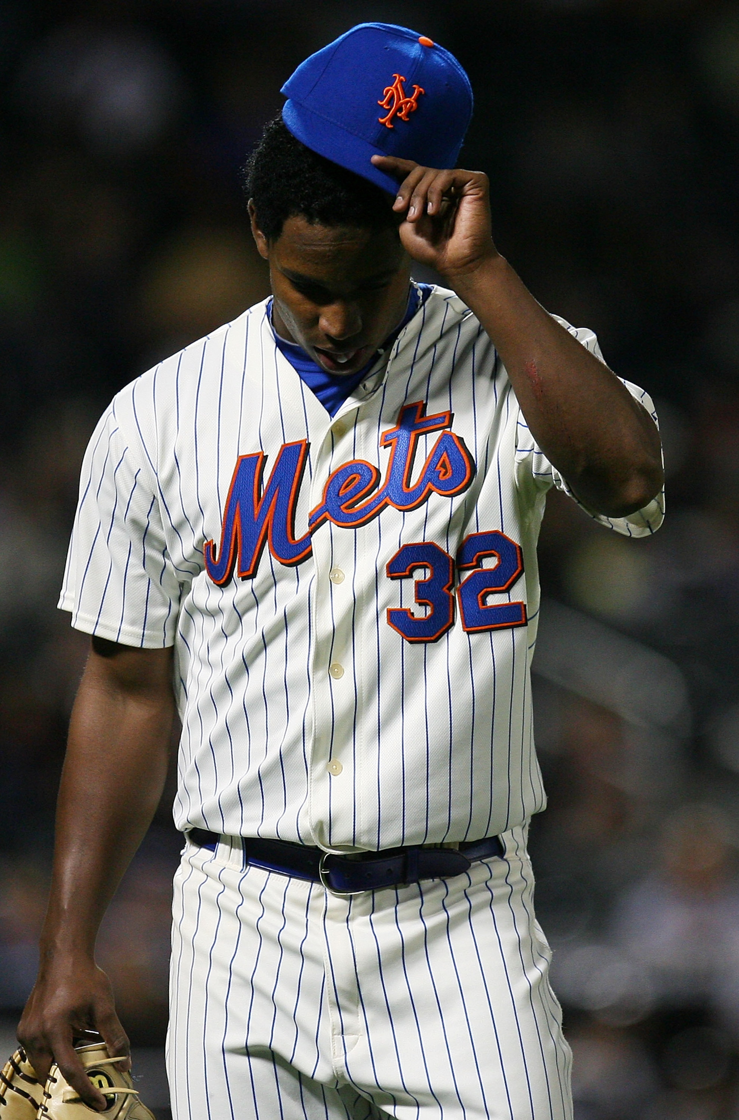 NEW YORK - SEPTEMBER 15: Jenrry Mejia #32 of the New York Mets comes off the field in the third inning against the Pittsburgh Pirates on September 15, 2010 at Citi Field in the Flushing neighborhood of the Queens borough of New York City. (Photo by Andr NEW YORK - SEPTEMBER 15: Jenrry Mejia #32 of the New York Mets comes off the field in the third inning against the Pittsburgh Pirates on September 15, 2010 at Citi Field in the Flushing neighborhood of the Queens borough of New York City. (Photo by Andr