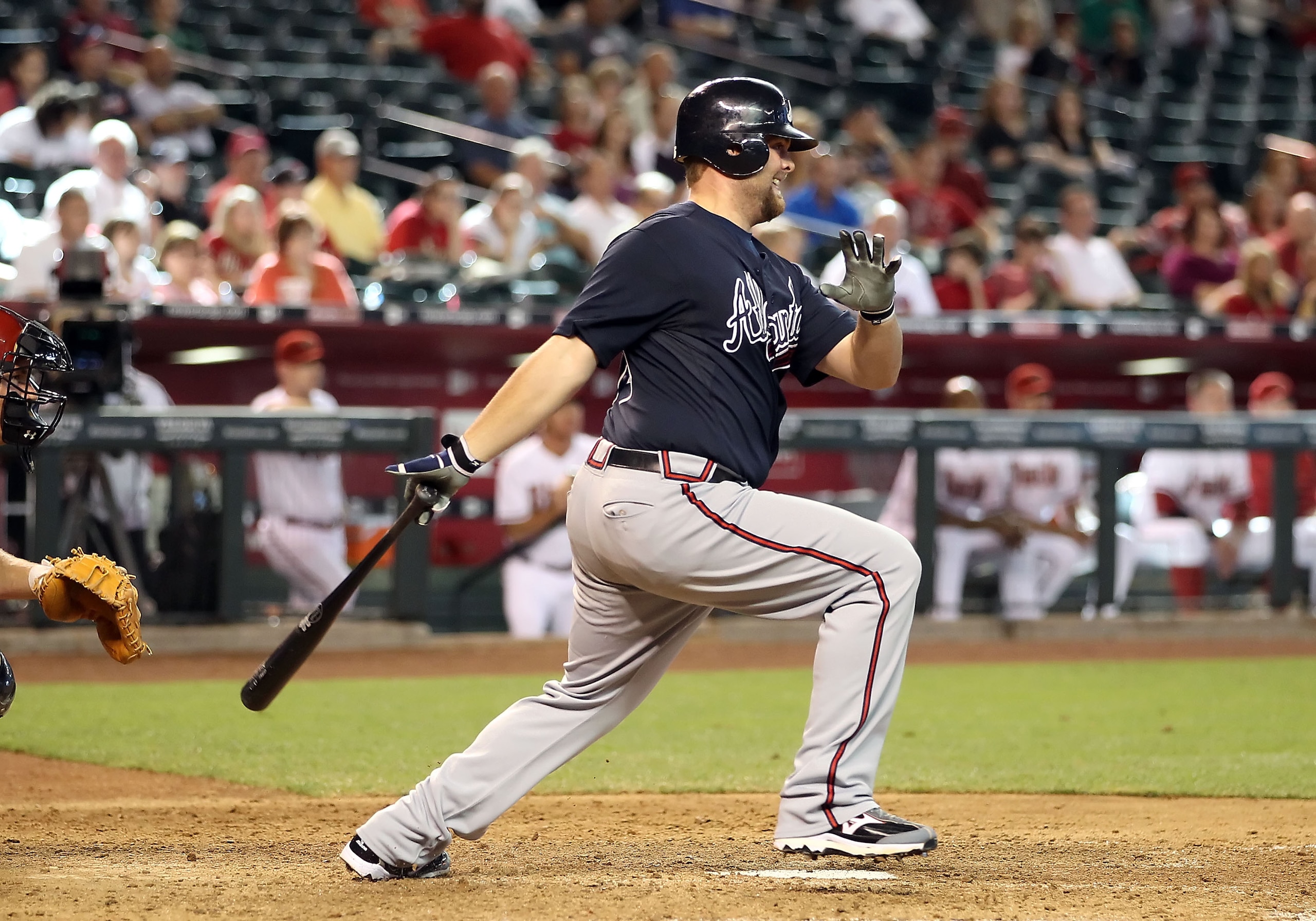 PHOENIX - JUNE 10:  Brian McCann #16 of the Atlanta Braves hits a RBI single against the Arizona Diamondbacks during the ninth inning of the Major League Baseball game at Chase Field on June 10, 2010 in Phoenix, Arizona. The Braves defeated the Diamondbac