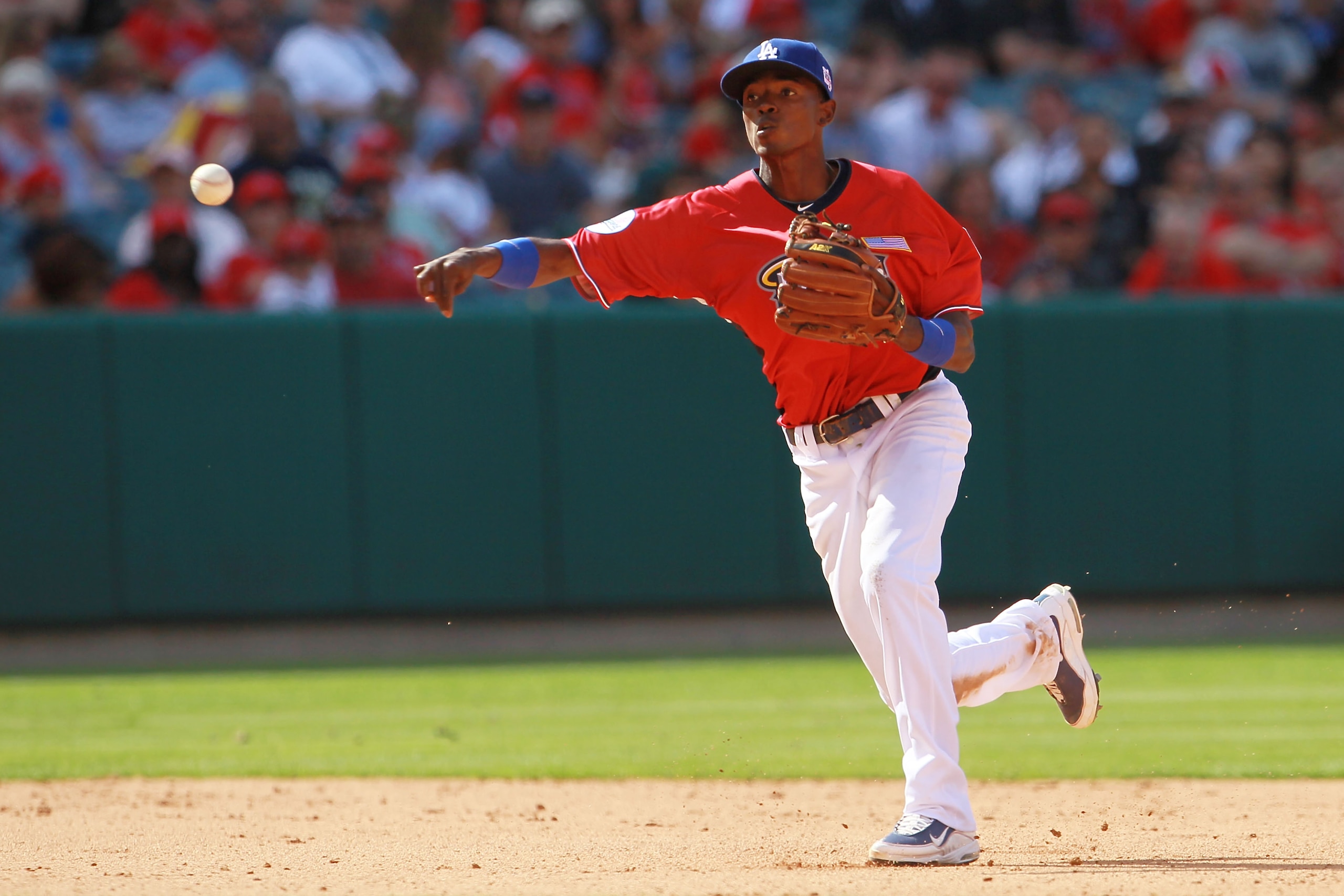 ANAHEIM, CA - JULY 11: U.S. Futures All-Star Dee Gordon #5 of the Los Angeles Dodgers throws the ball during the 2010 XM All-Star Futures Game at Angel Stadium of Anaheim on July 11, 2010 in Anaheim, California. (Photo by Jeff Gross/Getty Images) ANAHEIM, CA - JULY 11: U.S. Futures All-Star Dee Gordon #5 of the Los Angeles Dodgers throws the ball during the 2010 XM All-Star Futures Game at Angel Stadium of Anaheim on July 11, 2010 in Anaheim, California. (Photo by Jeff Gross/Getty Images)