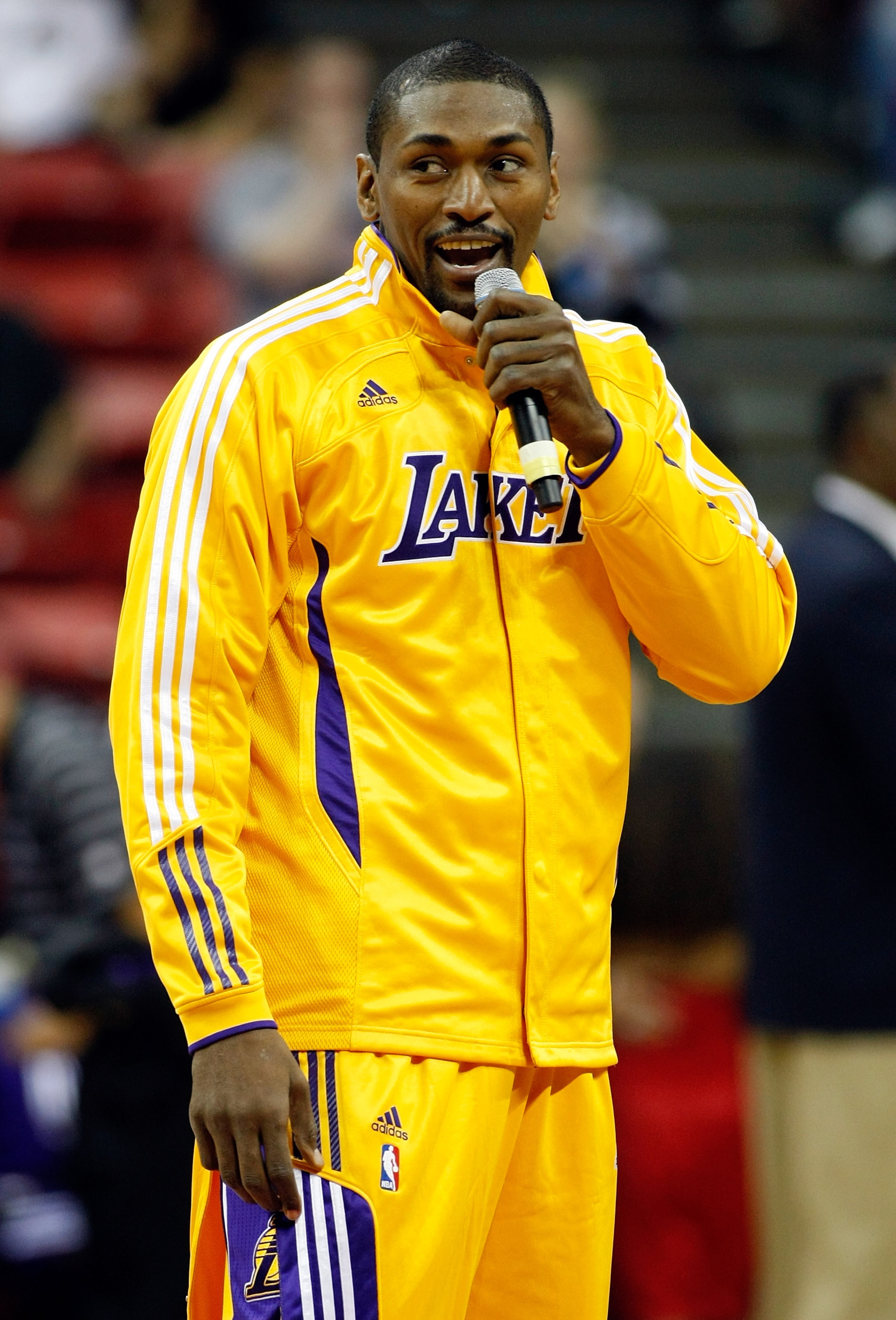 LAS VEGAS - OCTOBER 13:  Ron Artest #15 of the Los Angeles Lakers addresses the crowd before a preseason game against the Sacramento Kings at the Thomas & Mack Center October 13, 2010 in Las Vegas, Nevada. The Lakers won 98-95. NOTE TO USER: User expressl