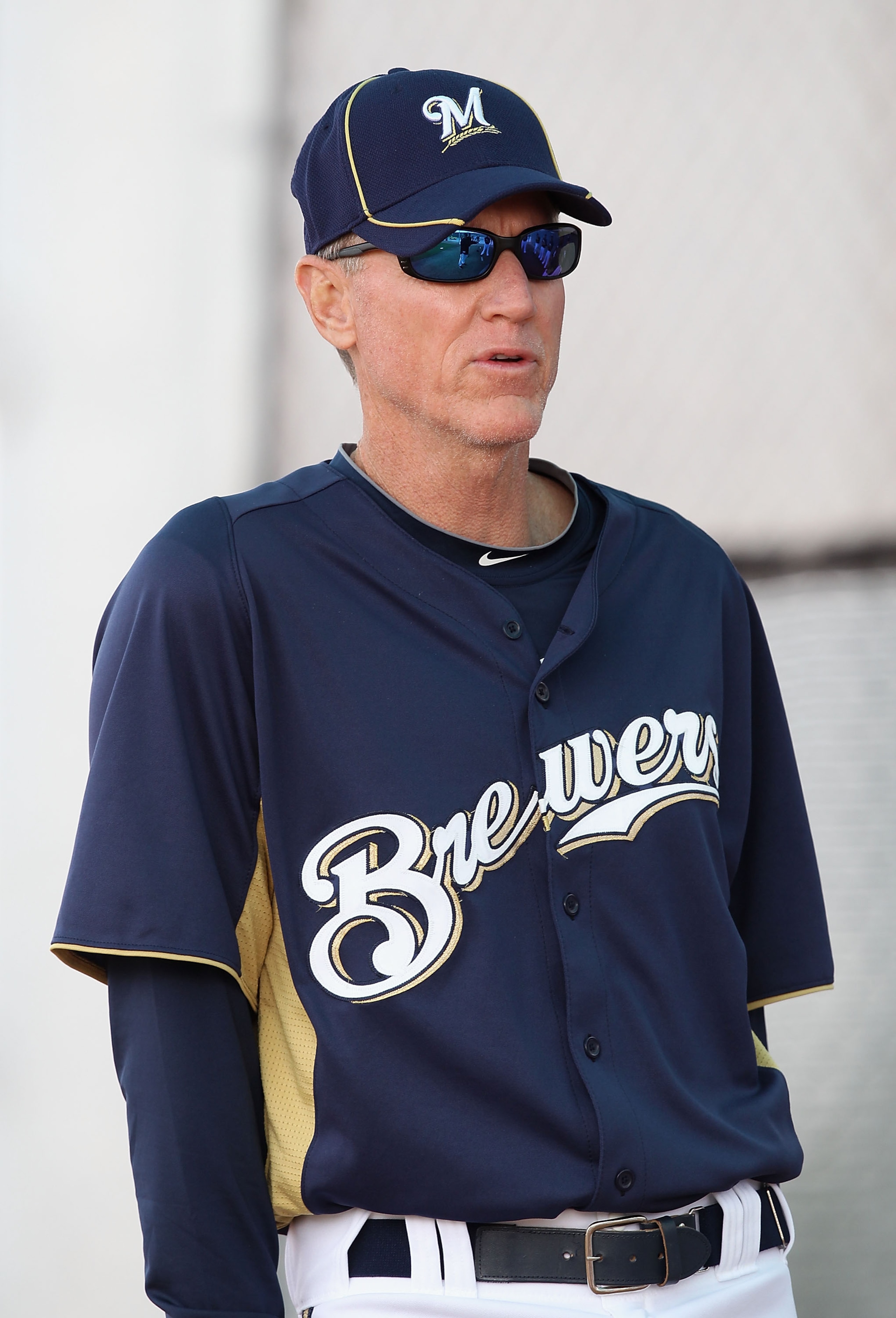 PHOENIX, AZ - FEBRUARY 18:  Manager Ron Roenicke #10 of the Milwaukee Brewers speaks with teammates during a MLB spring training practice at Maryvale Baseball Park on February 18, 2011 in Phoenix, Arizona.  (Photo by Christian Petersen/Getty Images)